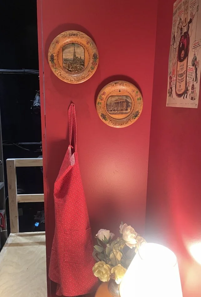 Religious and family themed apartment dressing for the opera “Street Scene”