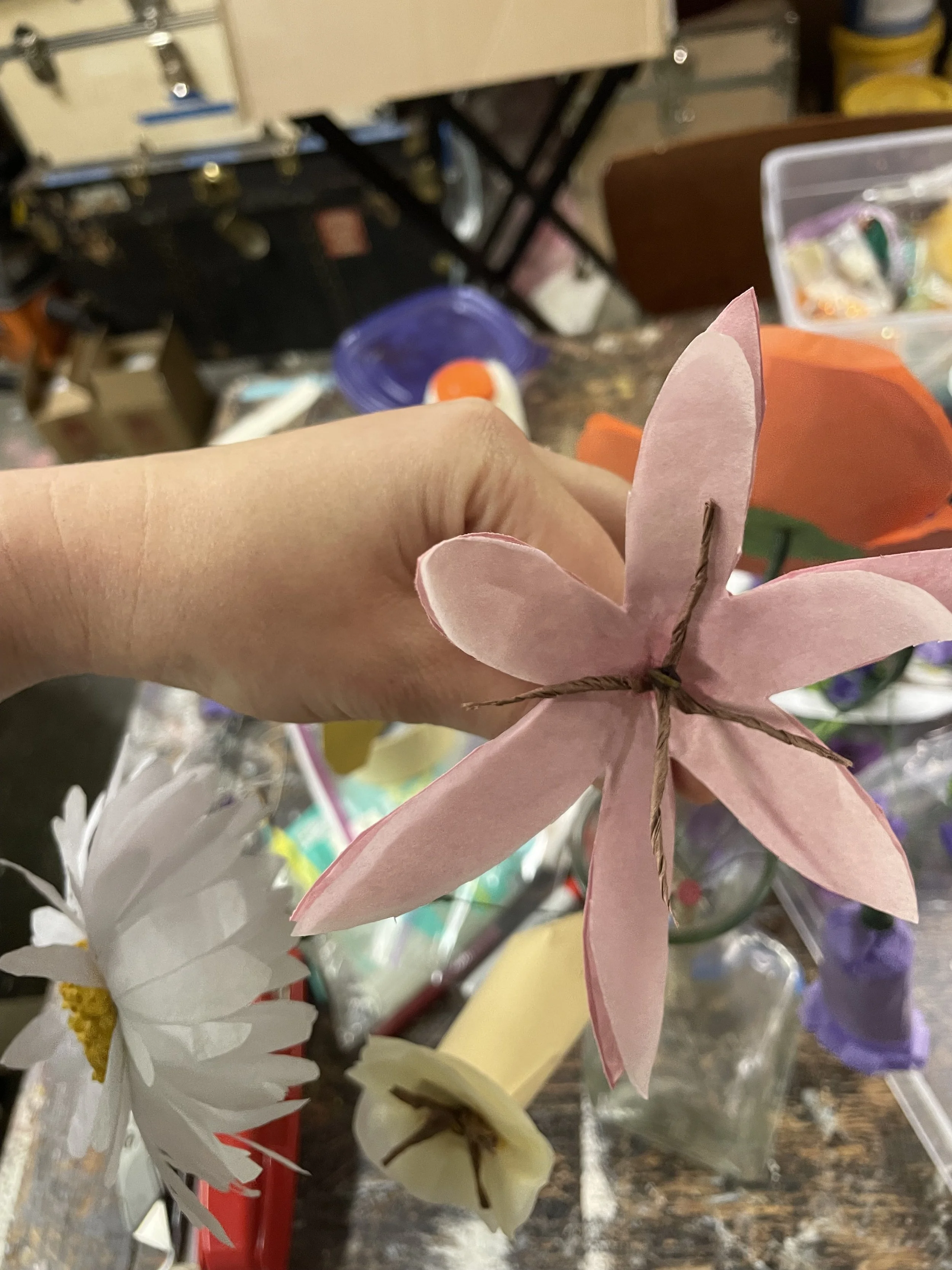 A handmade tissue paper flower for set decoration and prop use for the opera “The Pirates of Penzance”