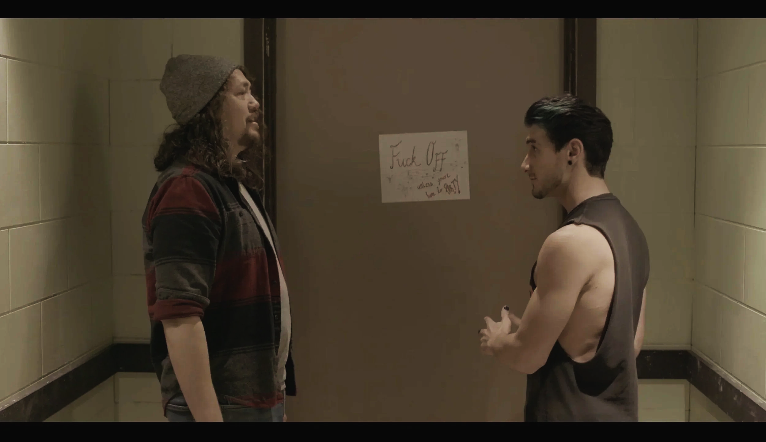 Close up of a hallway conversation in the film “Bad Examples,” a television pilot.