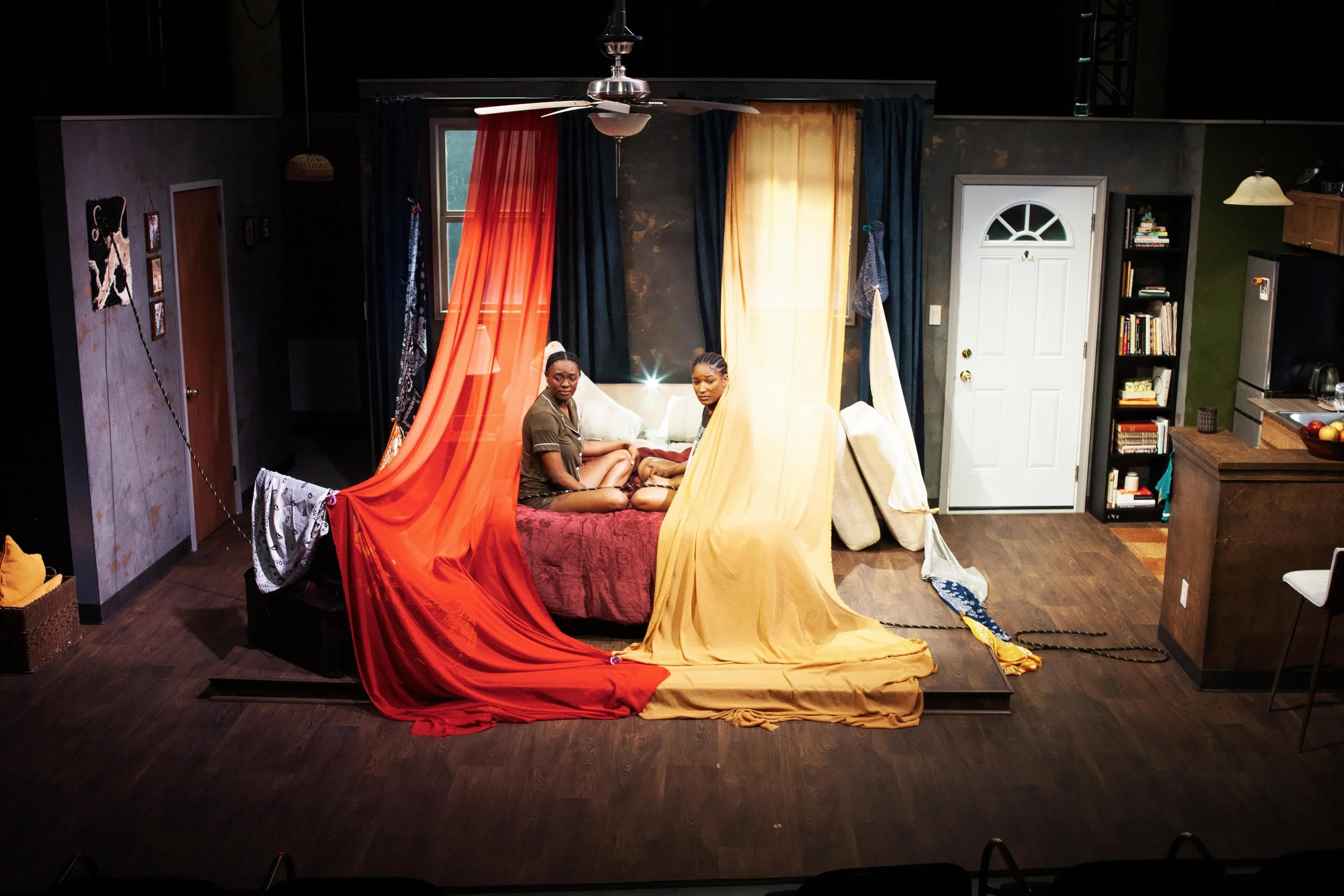 Wide-shot of the final fort post-falling onstage, during the ending sequence of the play “Furlough’s Paradise” by A.K. Payne