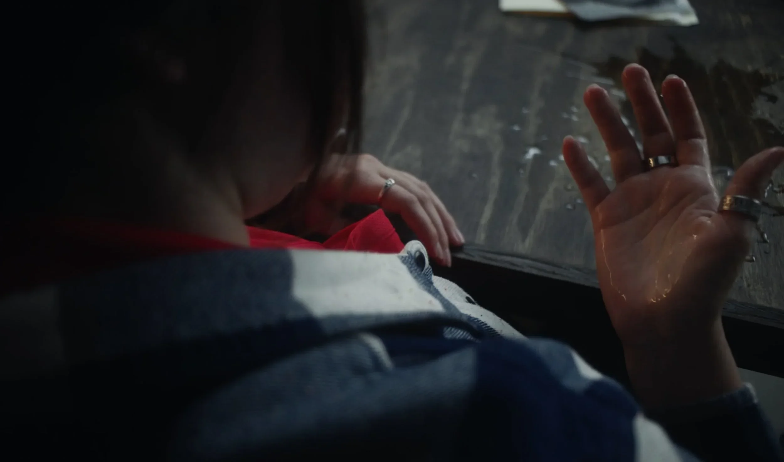 Close up of a slimy hand in the film “Wolf in Lamb’s Skin.”