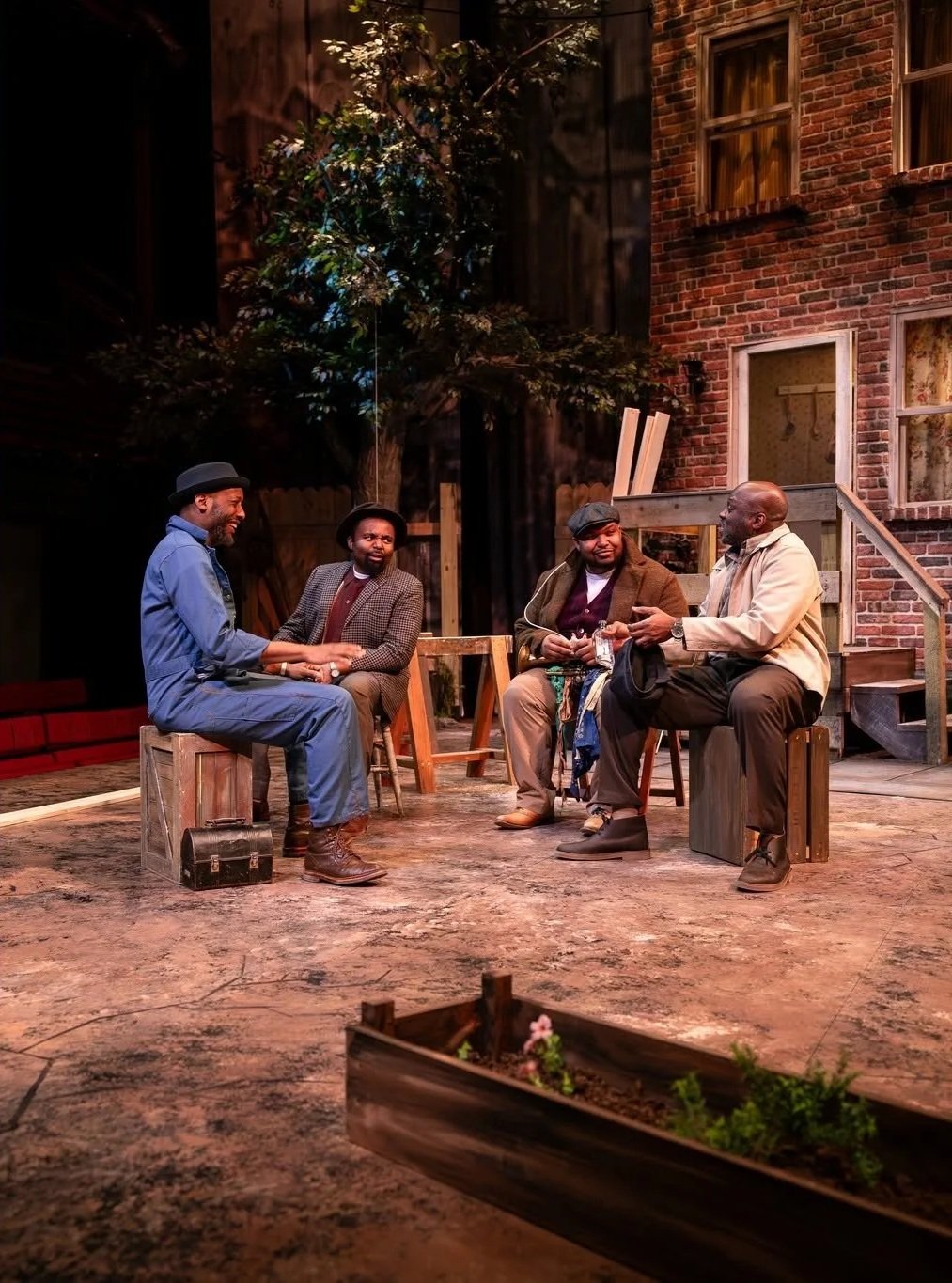 Show shot featuring the garden beds downstage in the play “Fences” by August Wilson