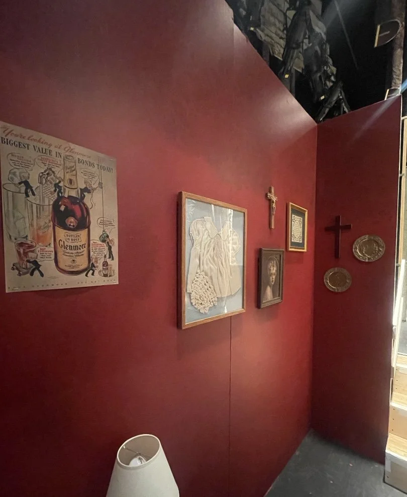 Religious and family themed apartment dressing for the opera “Street Scene”
