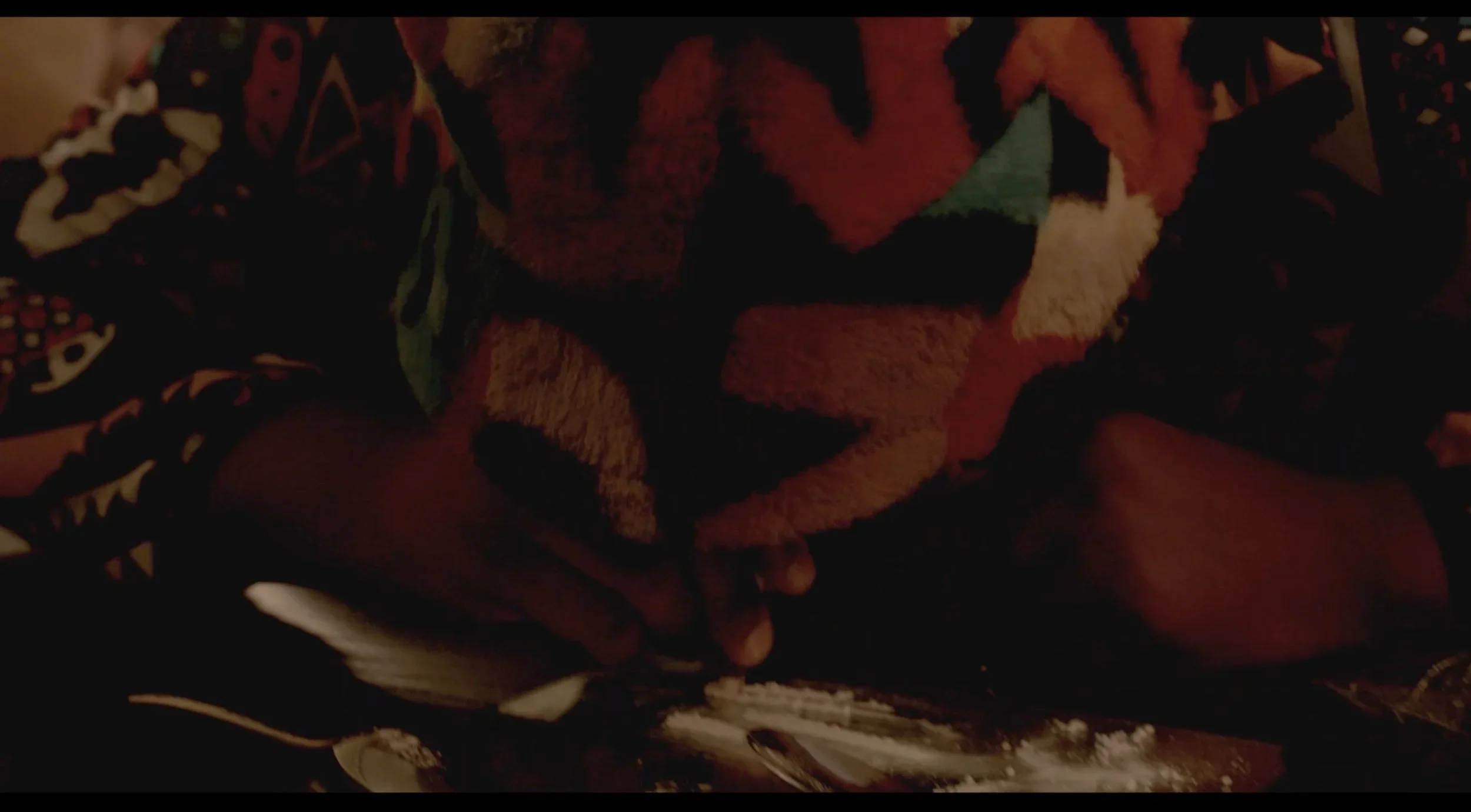 Close up of a character doing drugs on the set of the film “Bad Examples,” a television pilot.