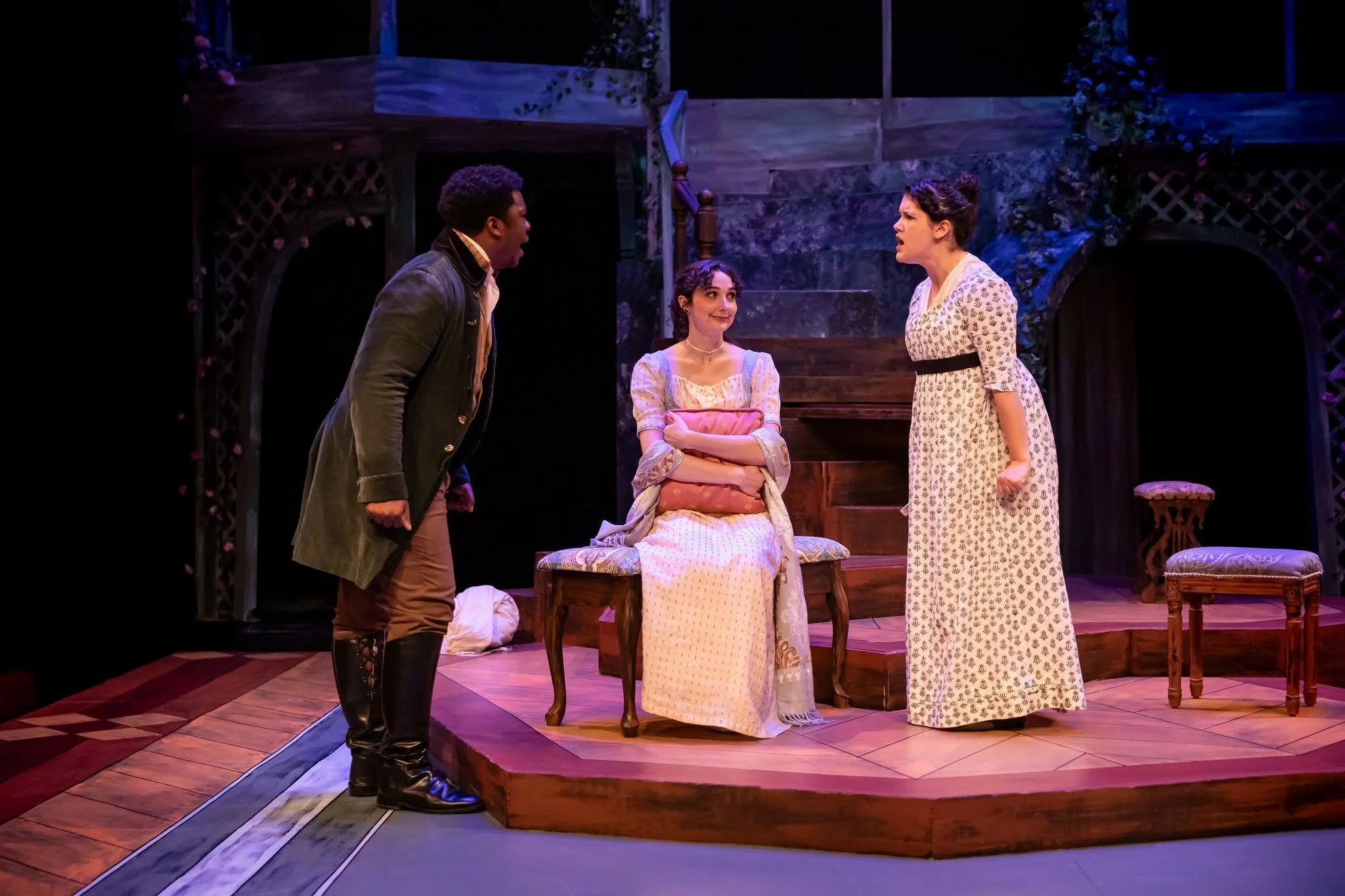 Shot of three actors in a parlor set for the play “Persuasion” by Jane Austen, adapted by Sarah Rose Kearns