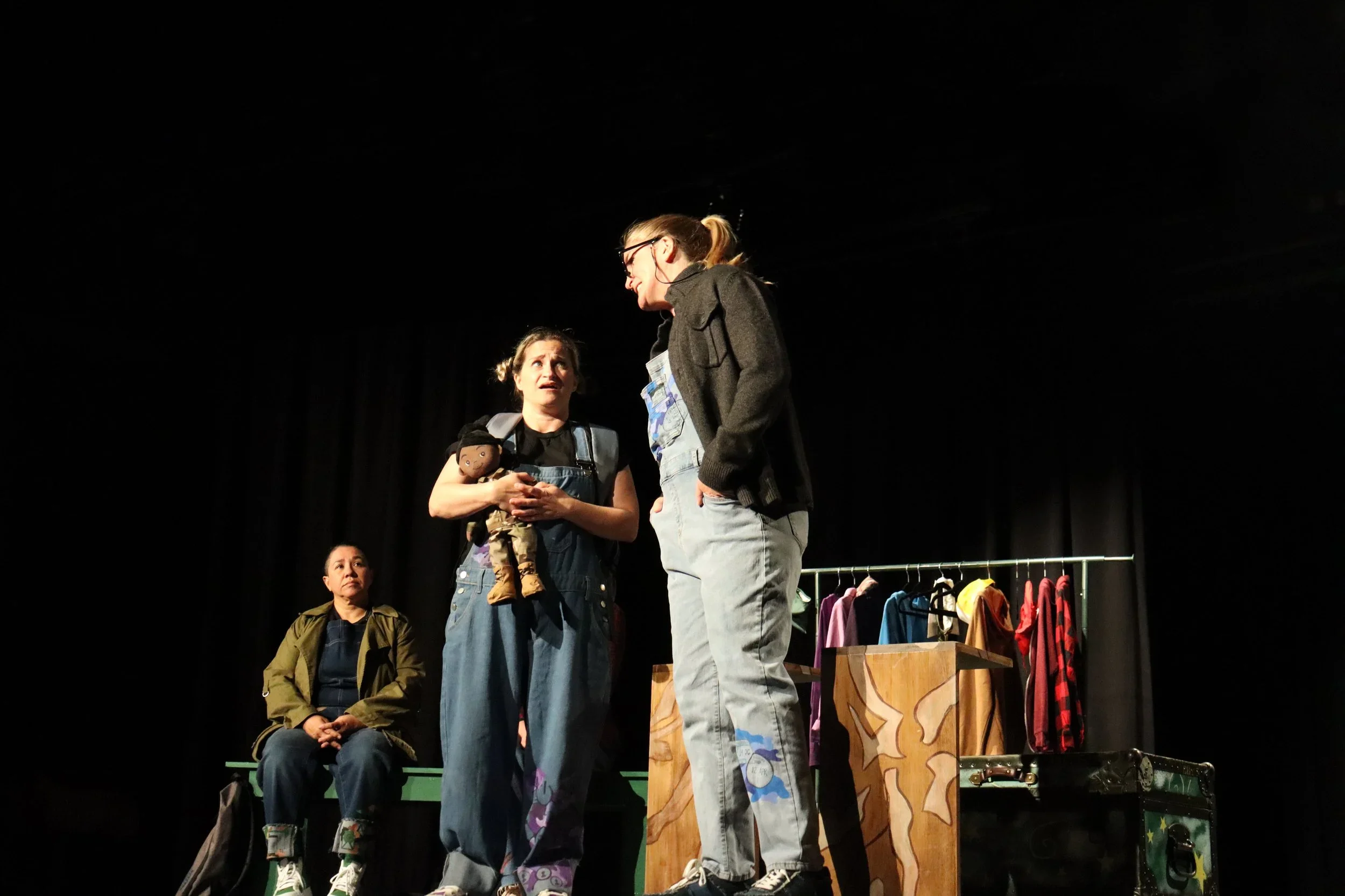 Characters chatting onstage for the world premiere play “BRAT” by Wendy Maples