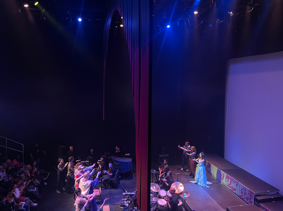 A side shot showing the archway proscenium and painted platform facing for the scenic design of the world premiere Opera “The Magic Hummingbird”