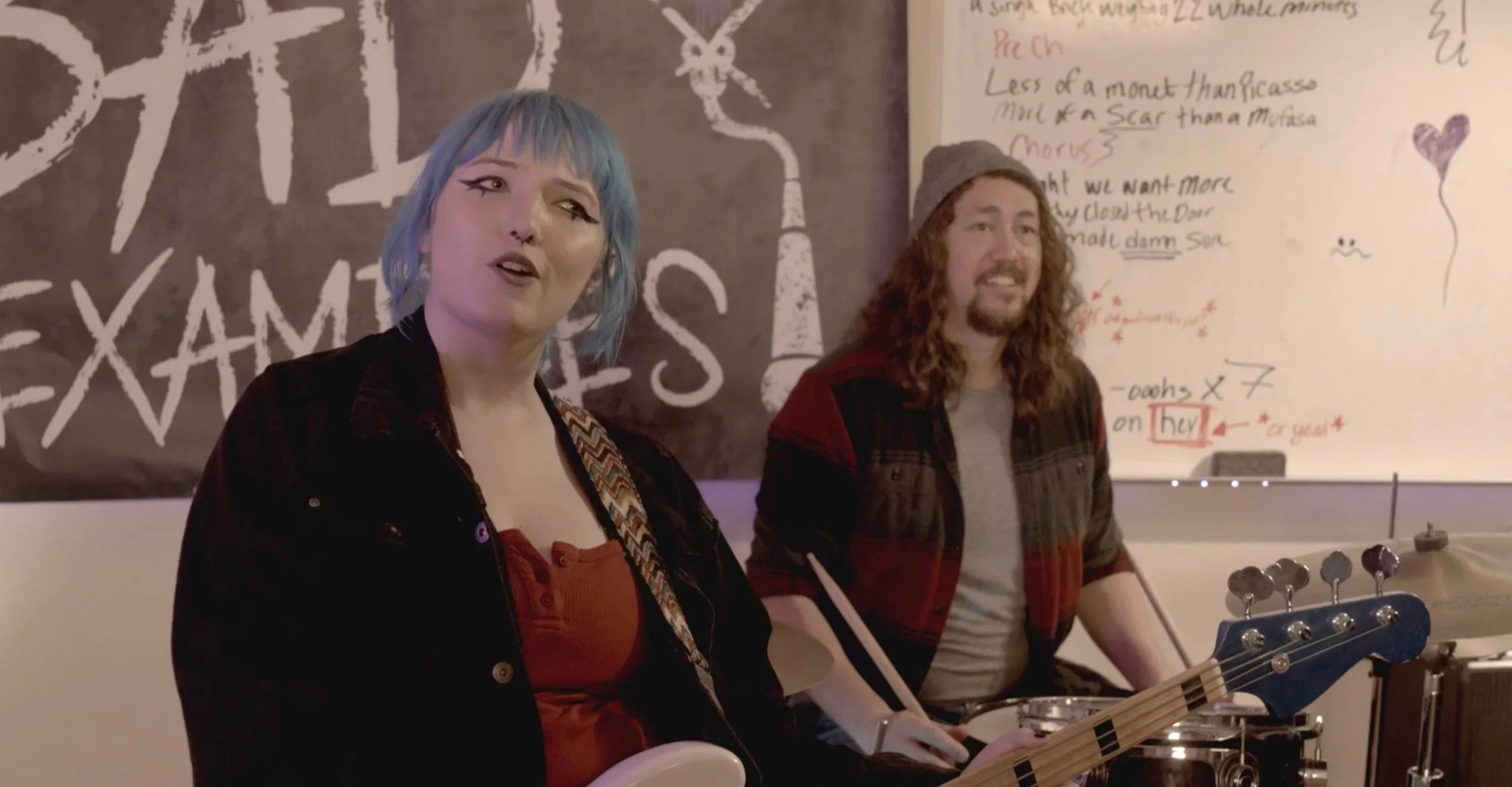Shot of two musicians in the band room set of the film “Bad Examples,” a television pilot.