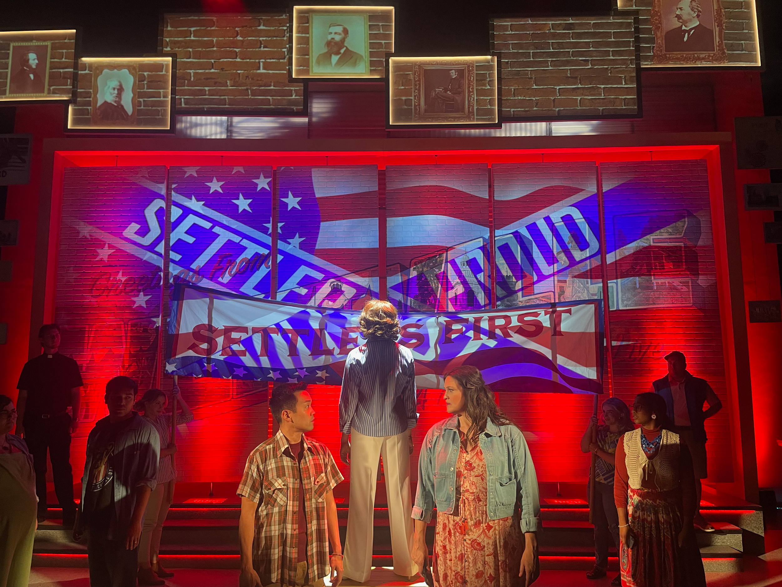 Political rally projection design onstage for the world premiere musical “Postcard American Town”