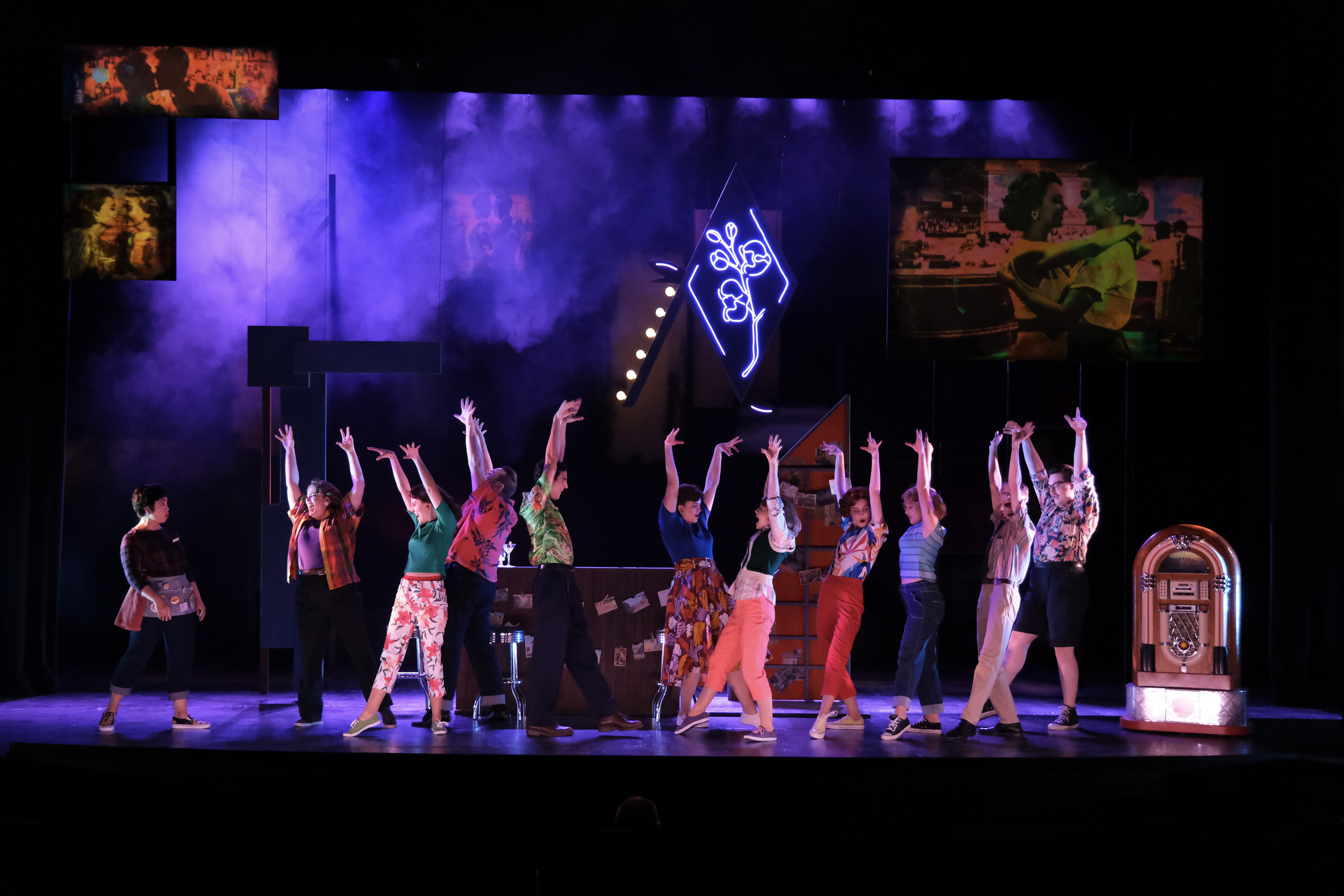 Patrons dancing in a gay bar on the scenic design for the world premiere musical “In a Sunshine State.”