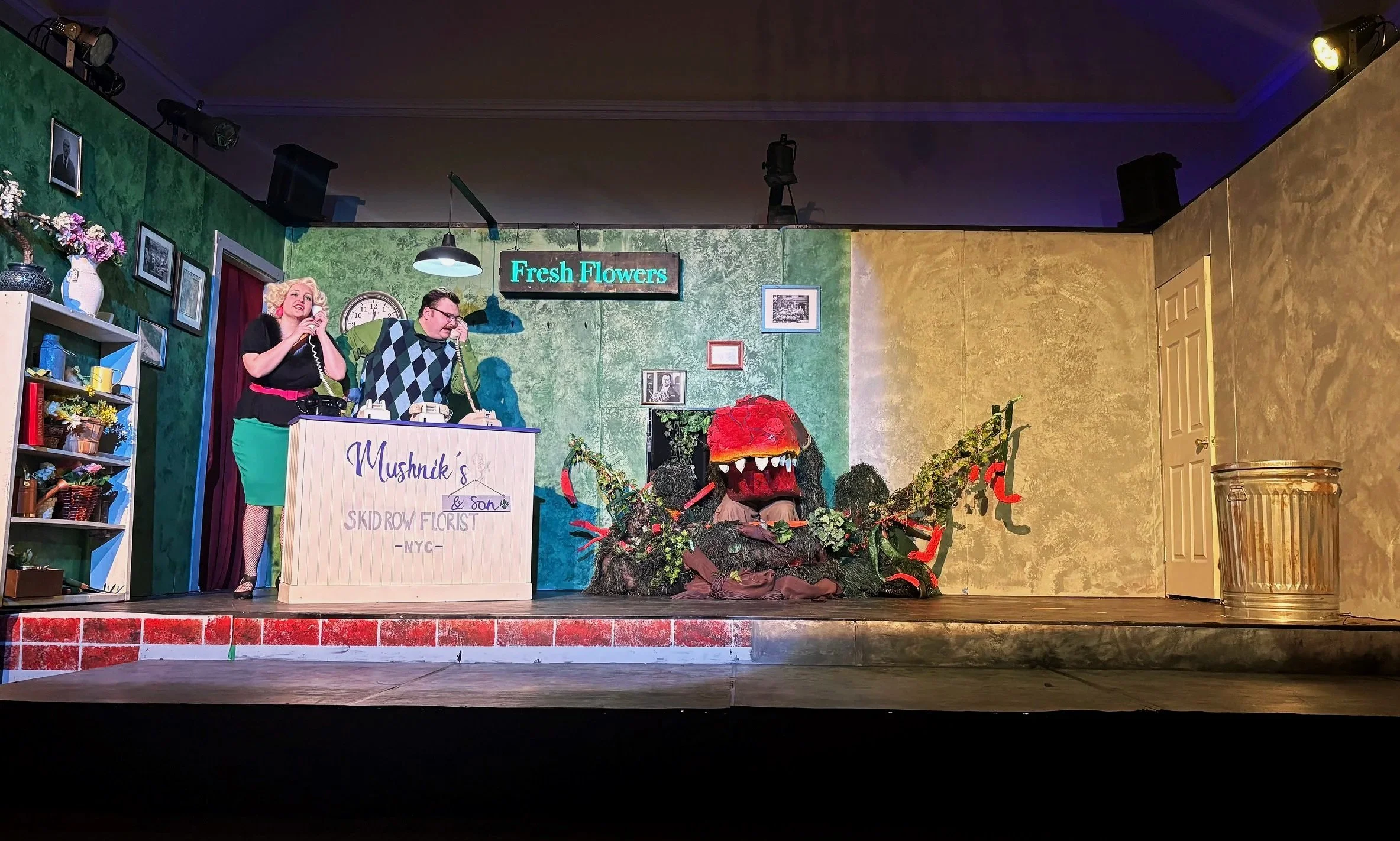 Set design featuring Audrey II for the musical “Little Shop of Horrors” by Alan Menken and Howard Ashman