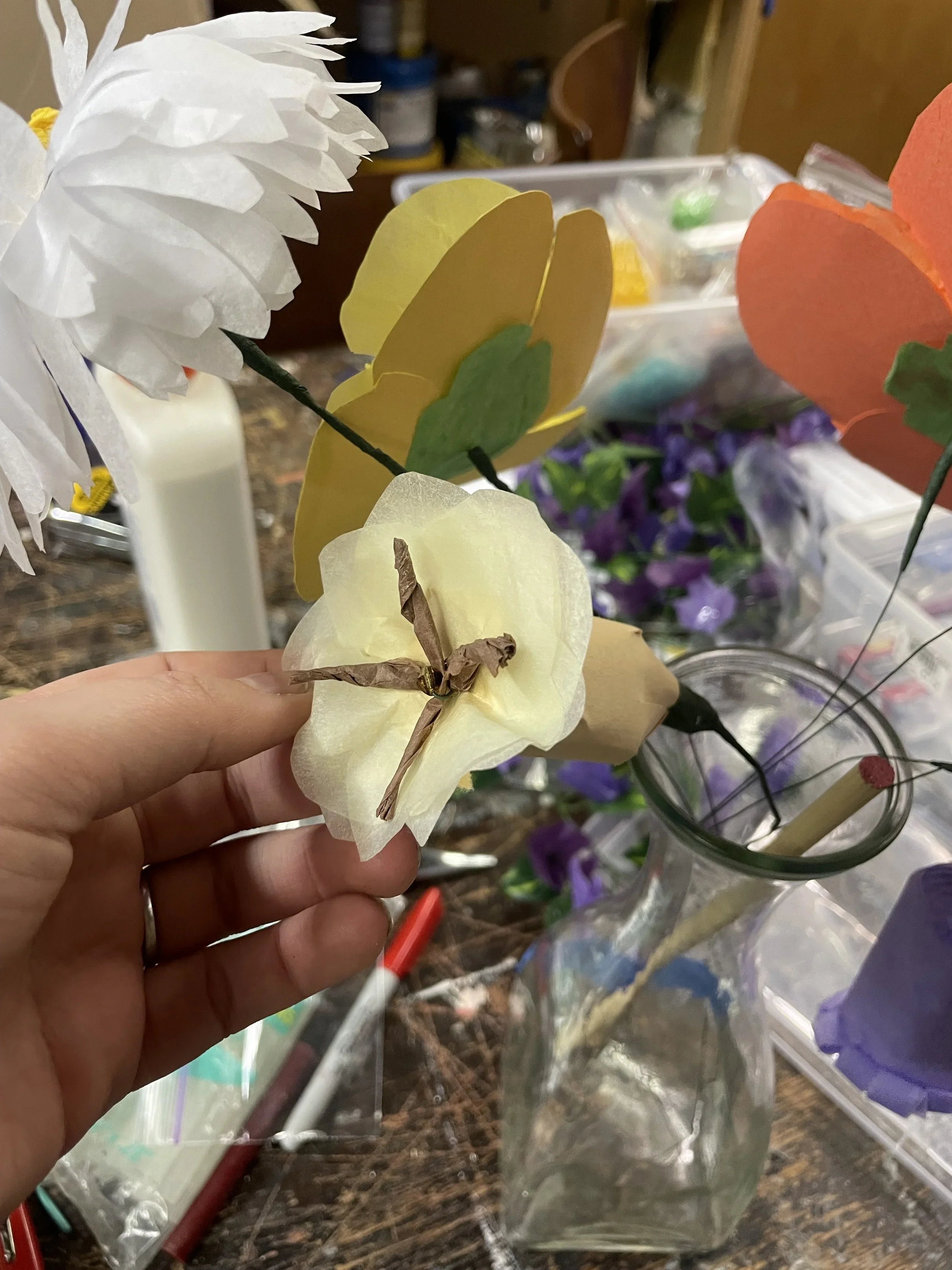 A handmade tissue paper flower for set decoration and prop use for the opera “The Pirates of Penzance”