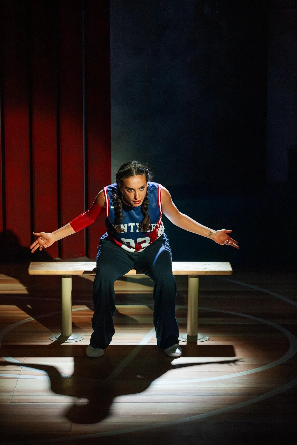Close-up on the basketball bench in the play “American Fast” by Kareem Fahmy