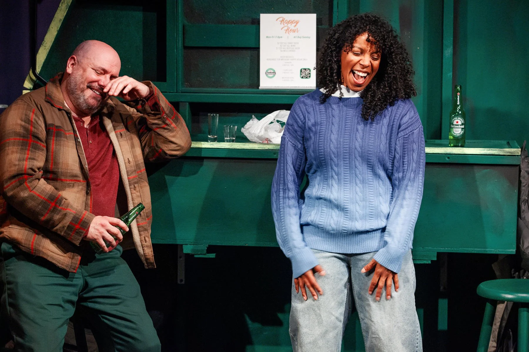 Danny and Marlowe, the two characters, in a bar in the play “The Garbologists” by Lindsay Joelle