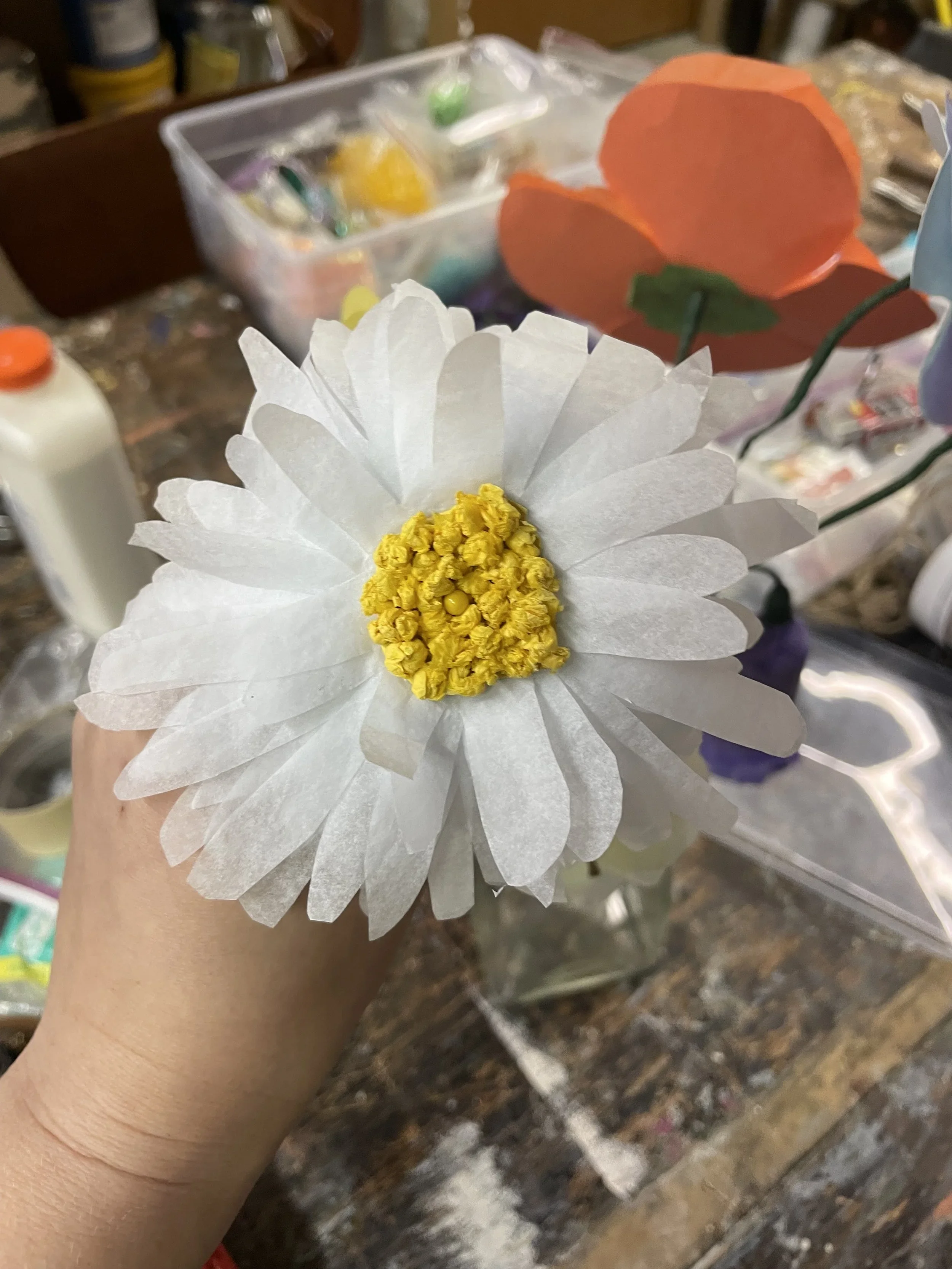 A handmade tissue paper flower for set decoration and prop use for the opera “The Pirates of Penzance”