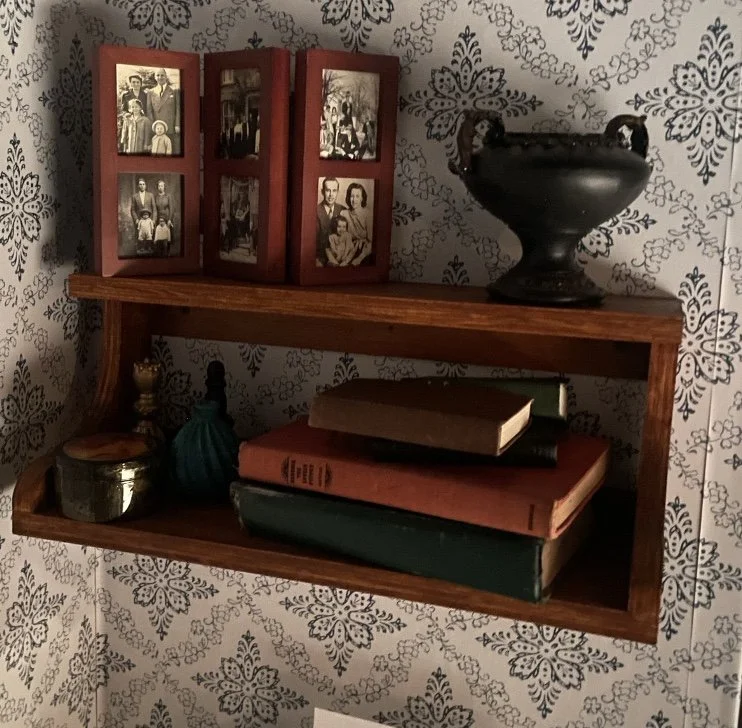 Books and history themed apartment dressing for the opera “Street Scene”