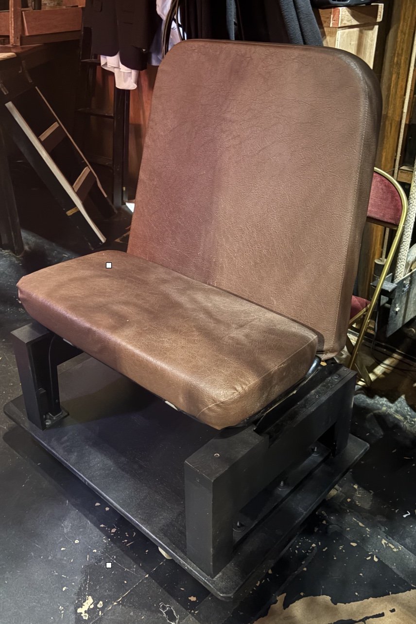 Backstage photo of the back platform of the car for the opera “The Knock”