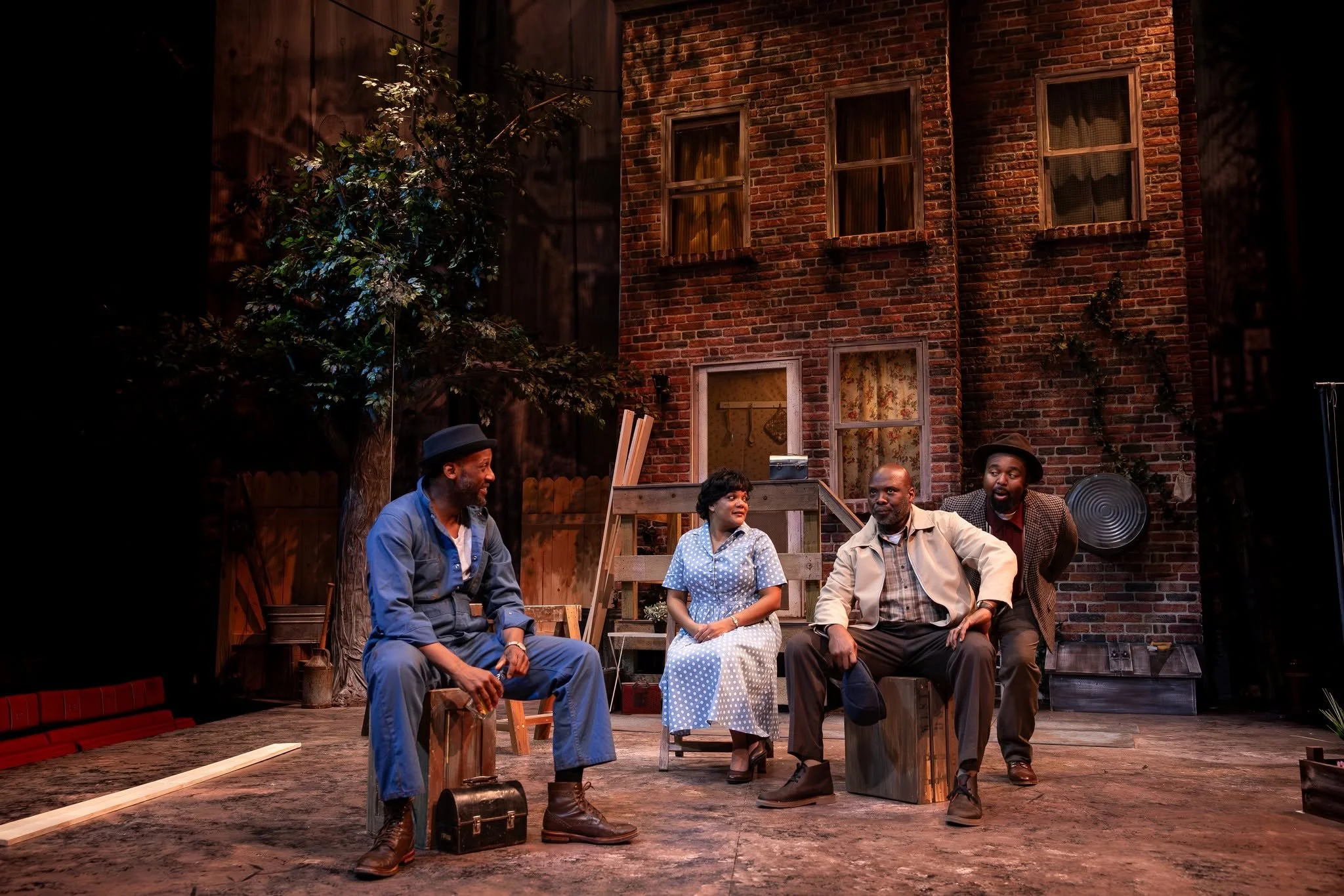 A conversation in the yard in the play “Fences” by August Wilson