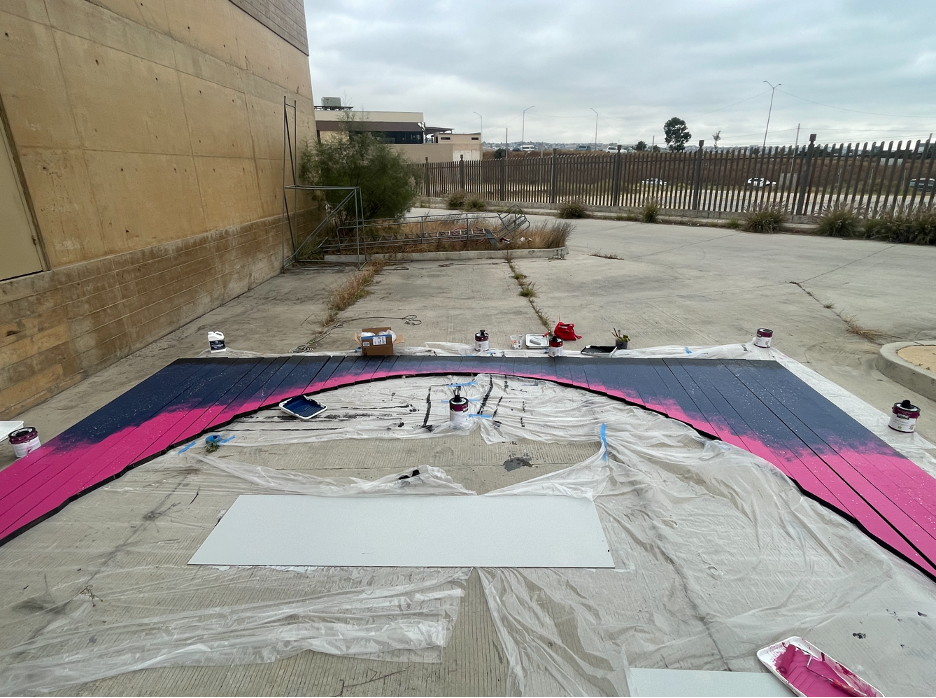 Painting process photo of the proscenium arch for the world premiere Opera “The Magic Hummingbird”