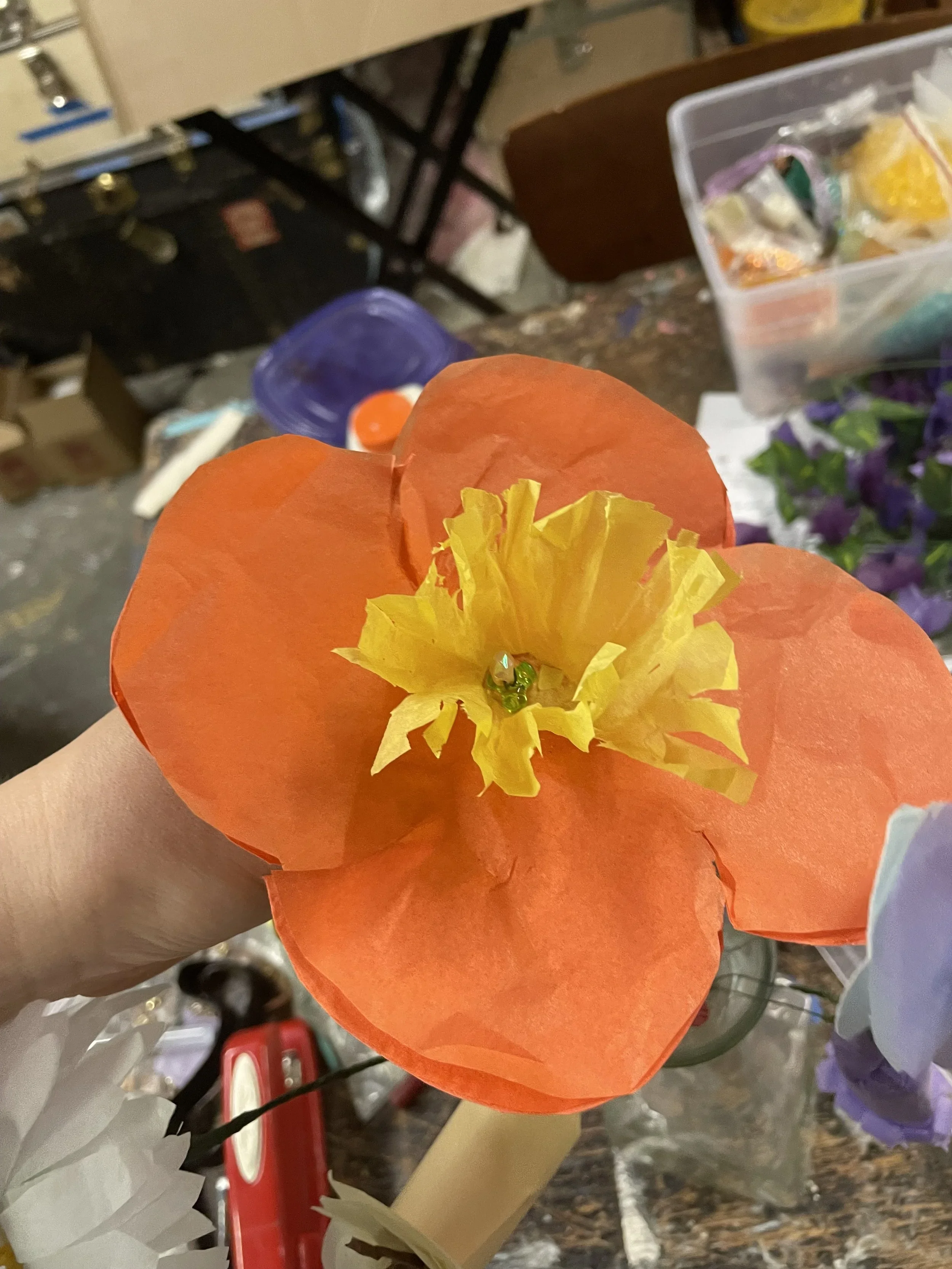 A handmade tissue paper flower for set decoration and prop use for the opera “The Pirates of Penzance”