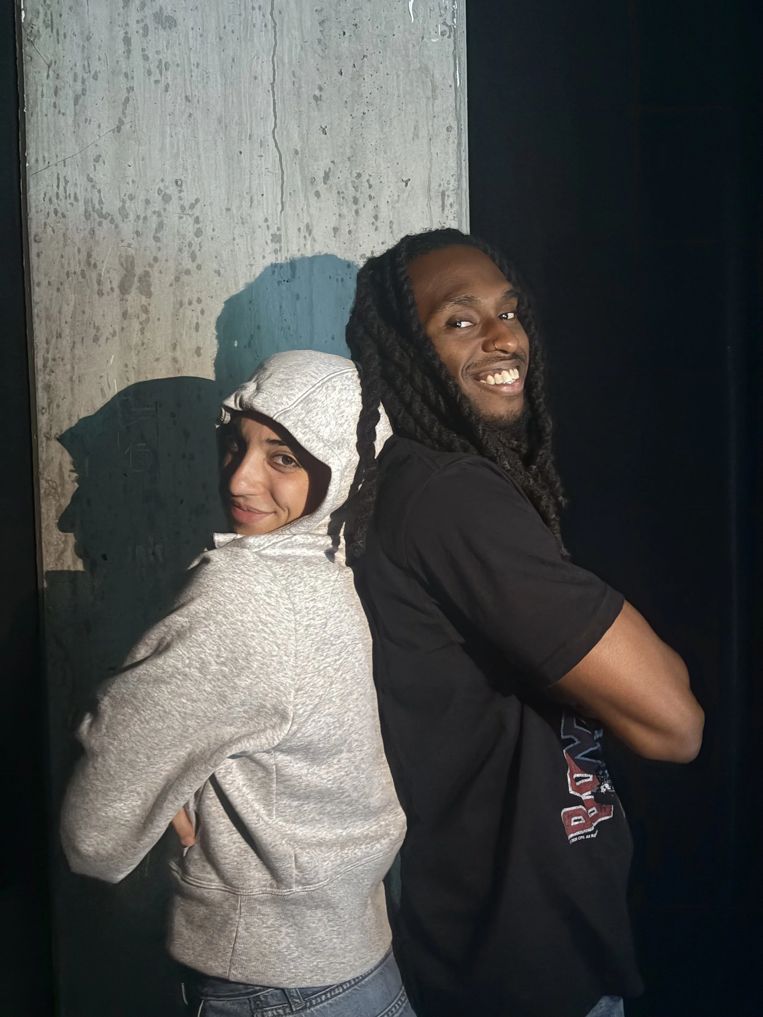 Picture of two actors in the play “American Fast” by Kareem Fahmy used to create personalized set dressing.
