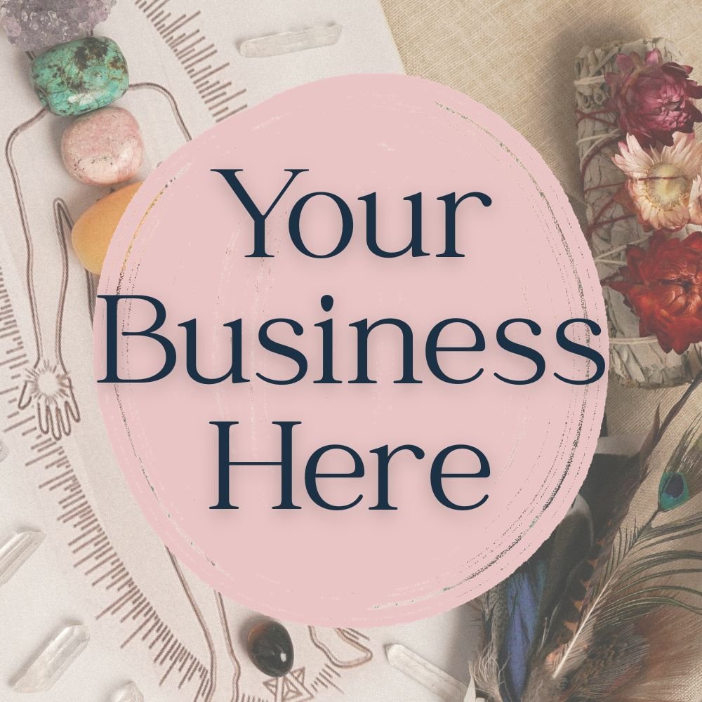 Blank sign with text 'Your Business Here' overlayed on a flat lay of crystals, flowers, a feather, and some jewelry.