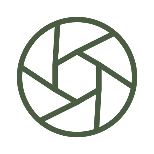 Icon of a camera shutter inside a circle.