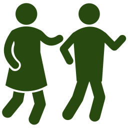 Silhouette of two people dancing or walking, one woman and one man, holding hands.