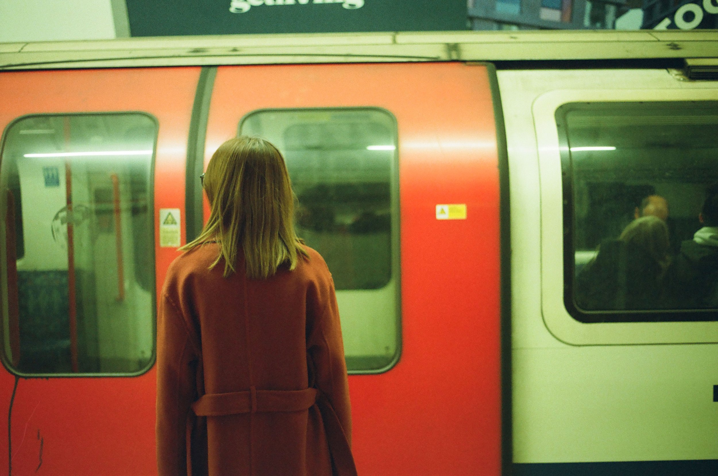 red-coat-woman-underground-london.jpg