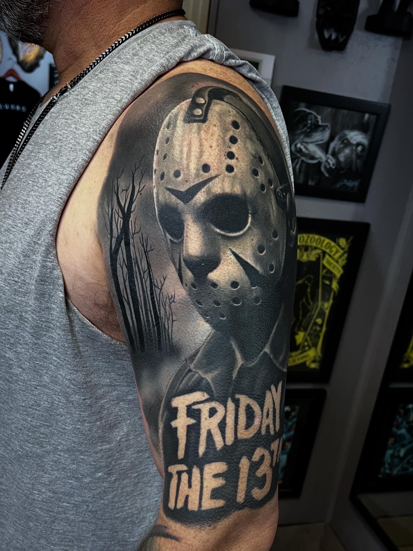 Black and gray Friday the 13th Jason tattoo by Jesse Smith at Human Production Gallery. 