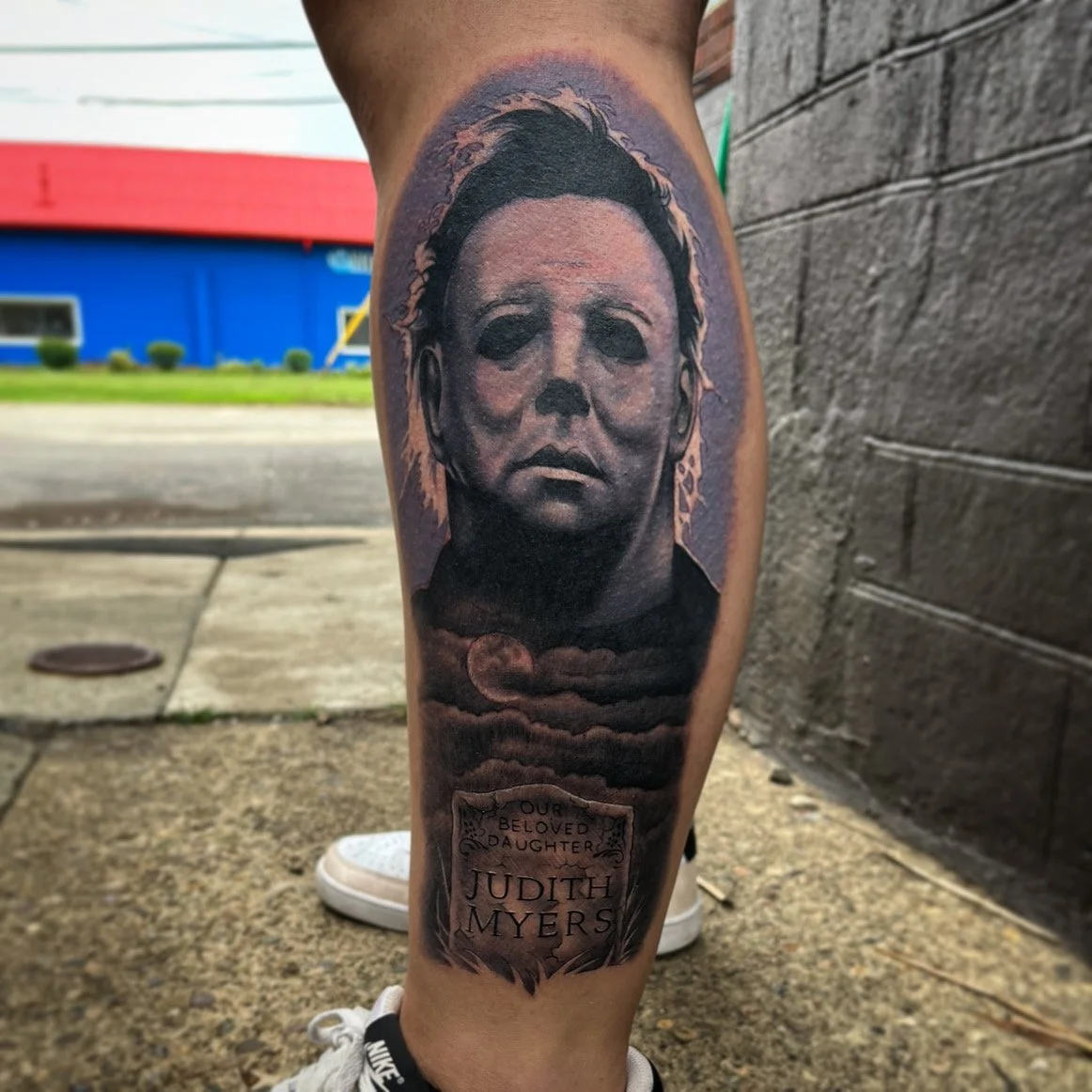 Black and gray Michael Myers leg tattoo by Jesse Smith in Bethel Park, Pa.