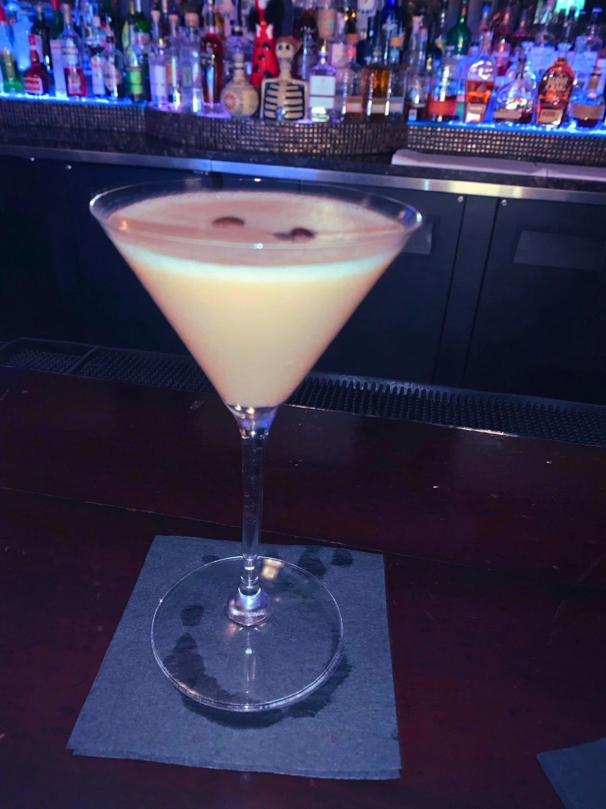 An espresso martini on the bar