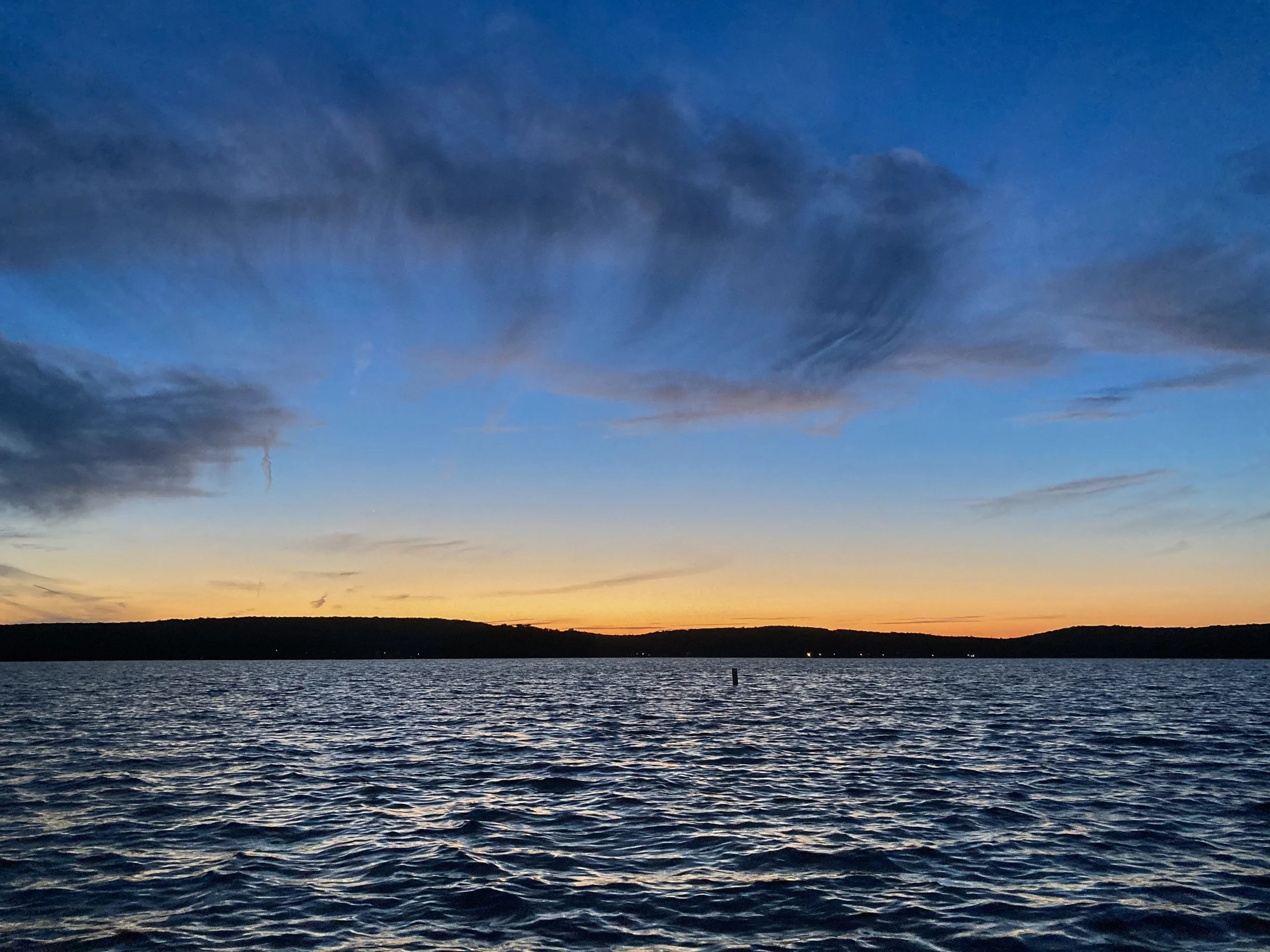 Warm sunset over rough waters of Lake Wallenpaupack, Pennsylvania