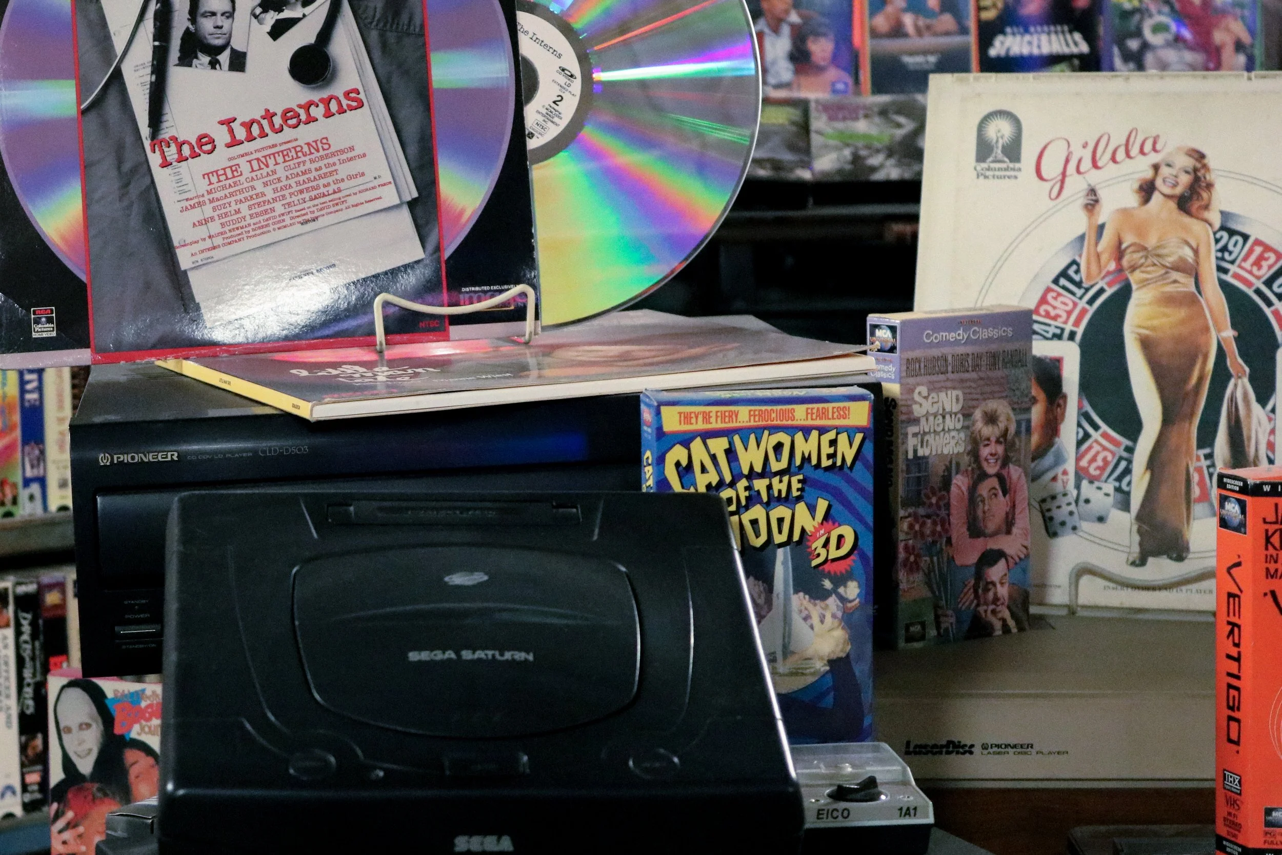 90s VHS tapes, Sega game console, and records at American Treasure Museum