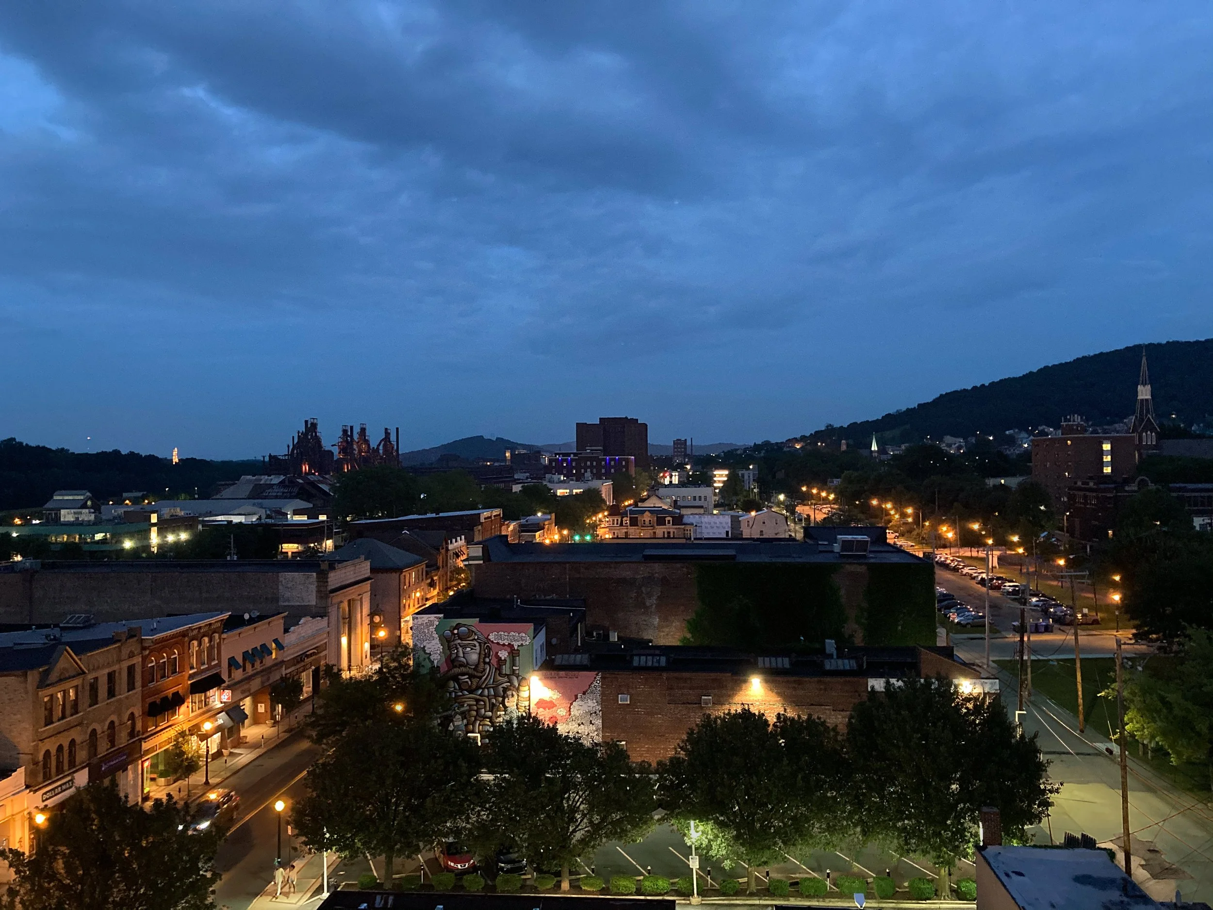 Nighttime view of South Side Bethlehem, Pennsylvania, with SteelStacks, illuminated buildings, and the evening sky