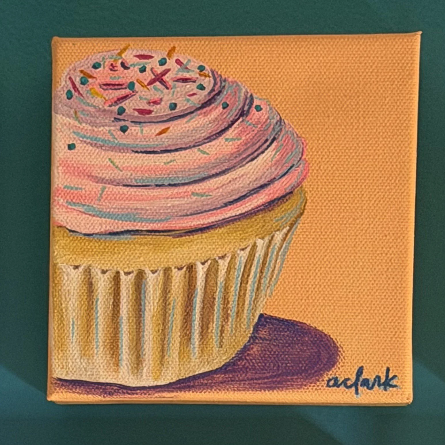 Sprinkled with Joy mini painting of a cupcake with pink frosting and colorful sprinkles against peach