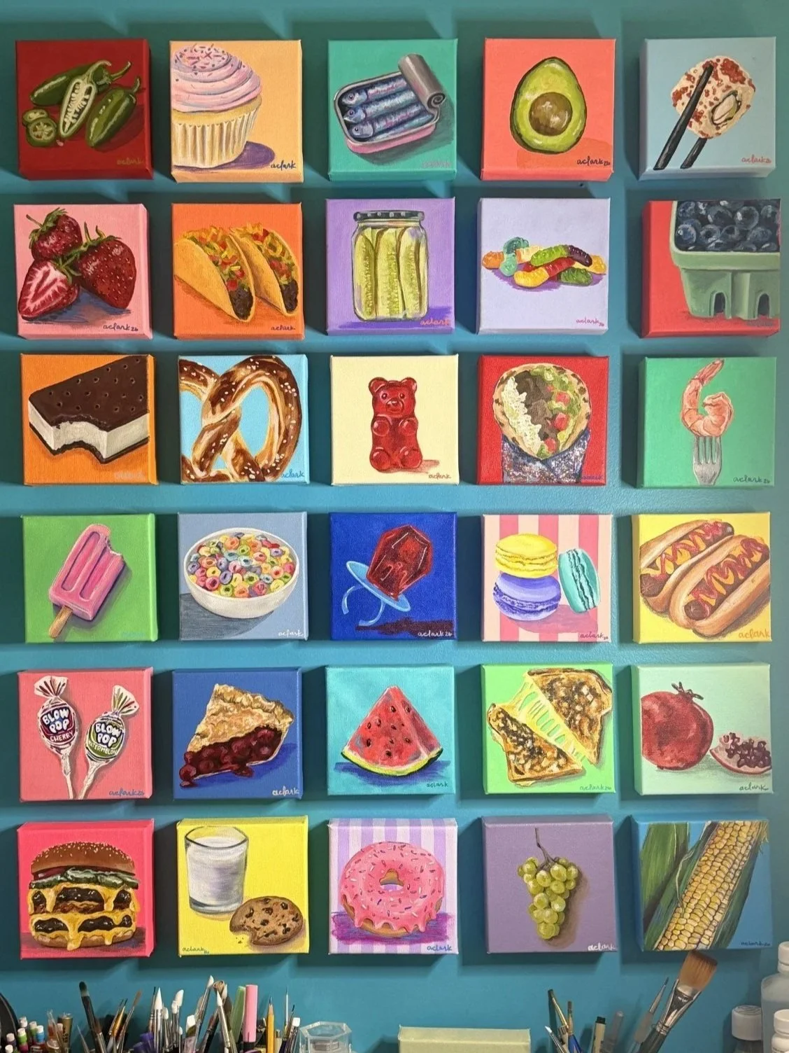Completed Tastes of Joy collection by Abby Clark, a colorful grid of miniature food paintings