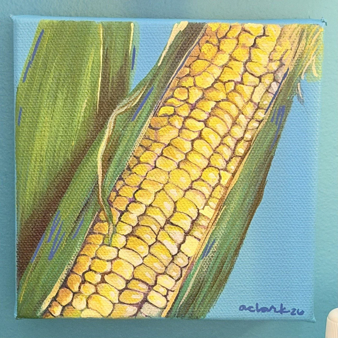 Golden corn on the cob mini painting by Abby Clark