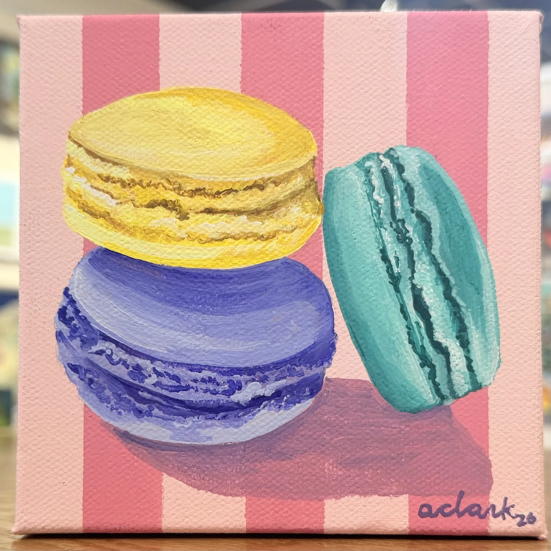 Yellow, purple, and blue macarons mini painting by Abby Clark