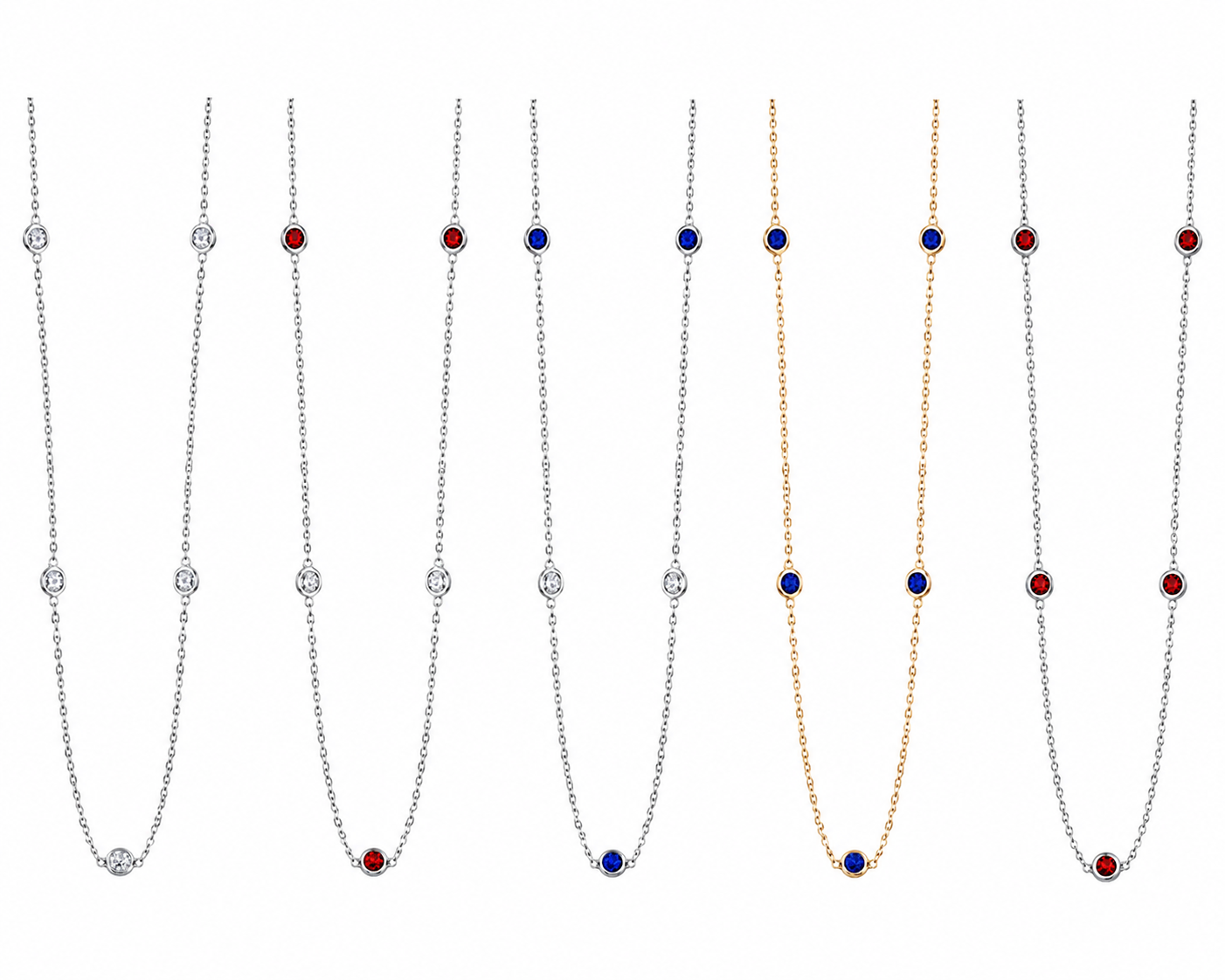 Multiple necklaces with small round-colored stones in silver and gold settings. The stones are in white, red, and blue.