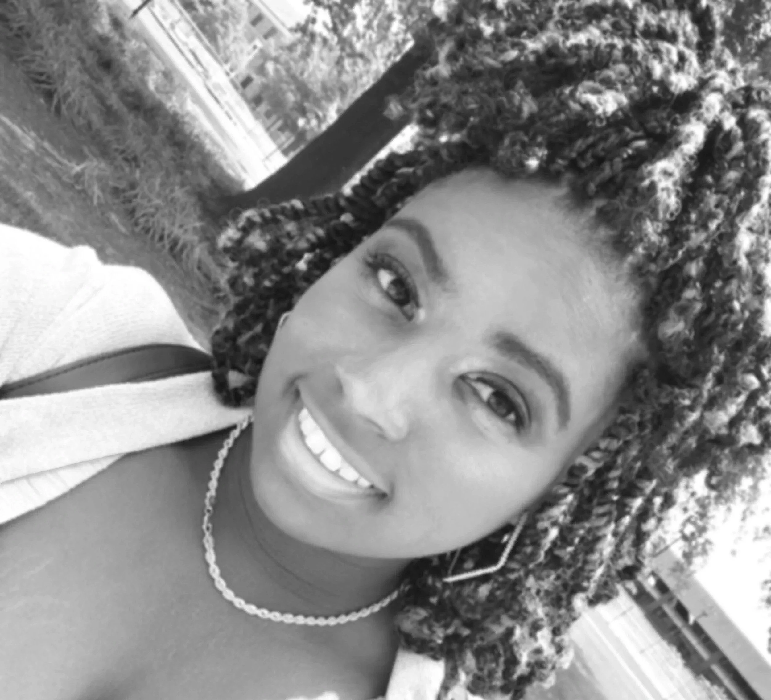 A portrait of Toni Taylor-Satterfield, a UX/UI designer based in Baltimore.