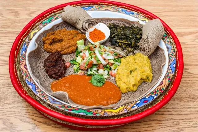 Explore our food gallery showcasing the rich flavors of Habesha cuisine, Ethiopian specialties, Middle Eastern favorites, and Western dishes. From traditional dishes like Tibsi, Beyaynetu, and Shikla Tibs to fresh seafood, grilled favorites, salads, 