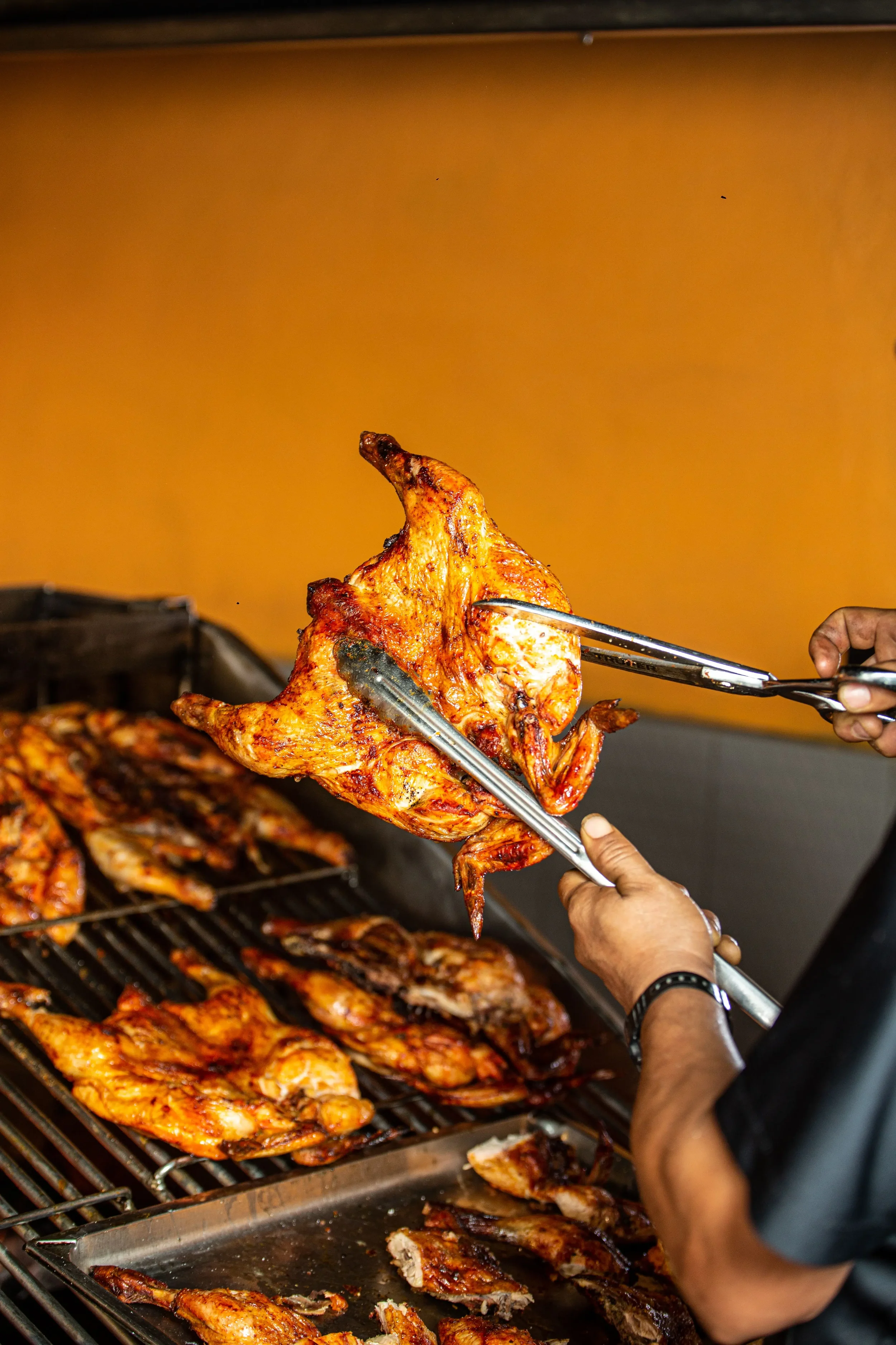 Grilled chicken breast seasoned with black pepper and spices served with rice or crispy fries