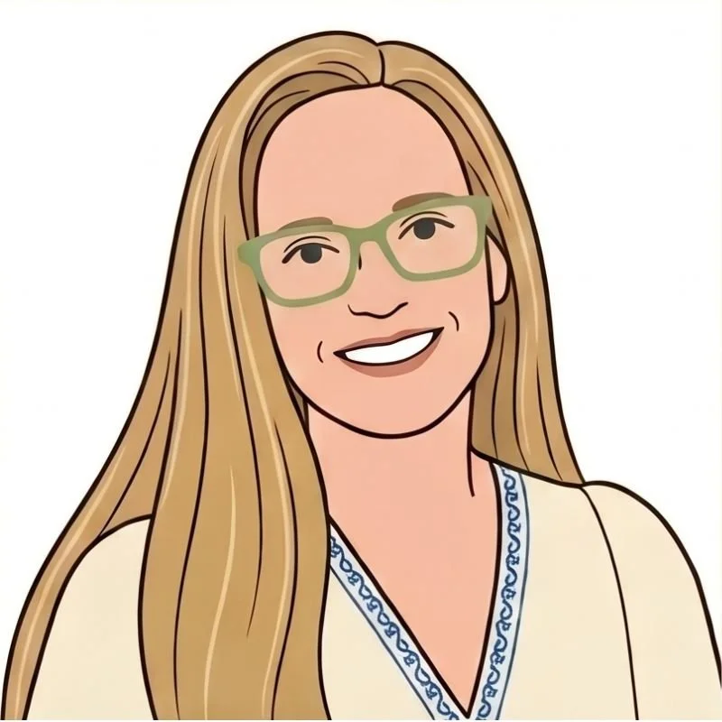 A cartoon illustration of a woman with long blonde hair, green glasses, and a white top with blue embroidery, smiling.