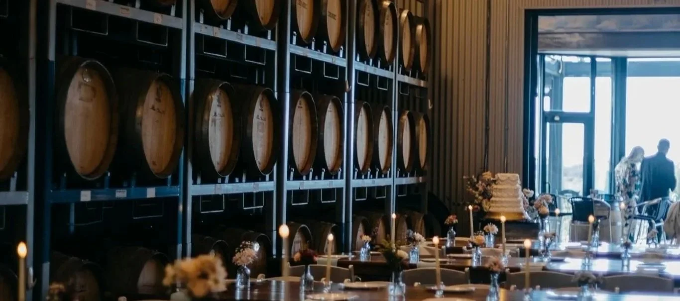 French Oak barrels aging wine at Bar Z Winery Canyon TX