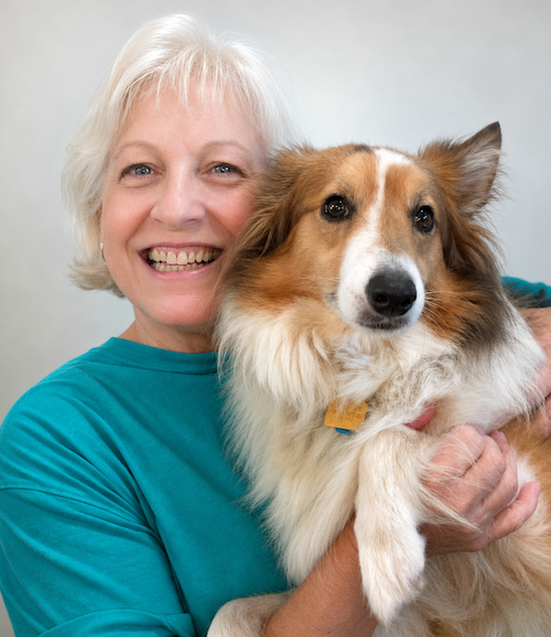 Marla holding Jeb, the Sheltie/Aussie mix