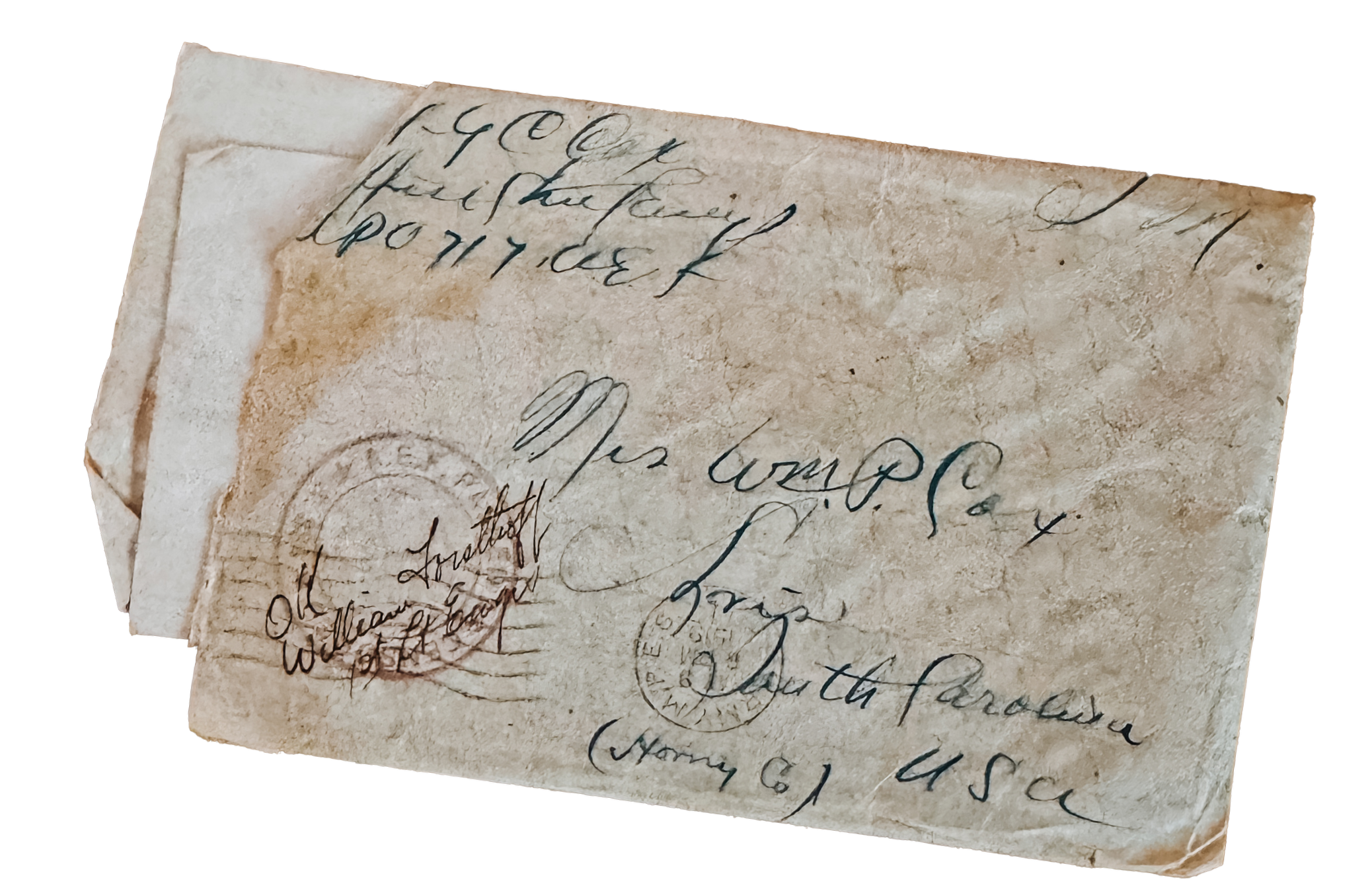 Close-up of an old handwritten letter with cursive script, ink stamps, and a vintage appearance.