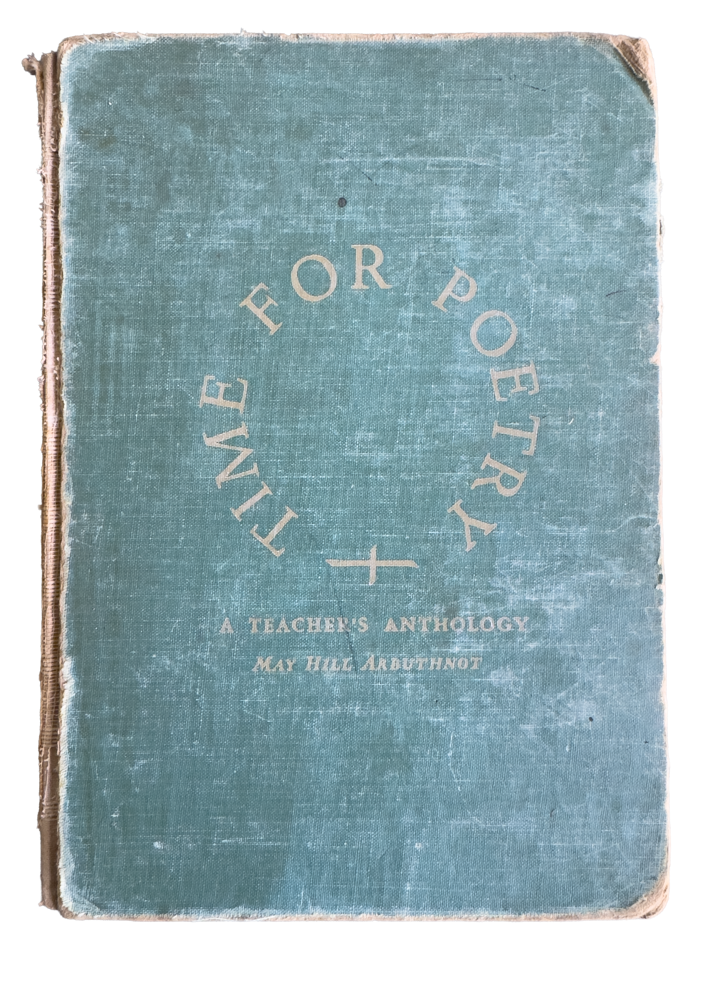 Close-up of a worn, blue hardcover book titled 'Nineteen for Poetry: A Teacher's Anthology' by May Hill Arbuthnot.