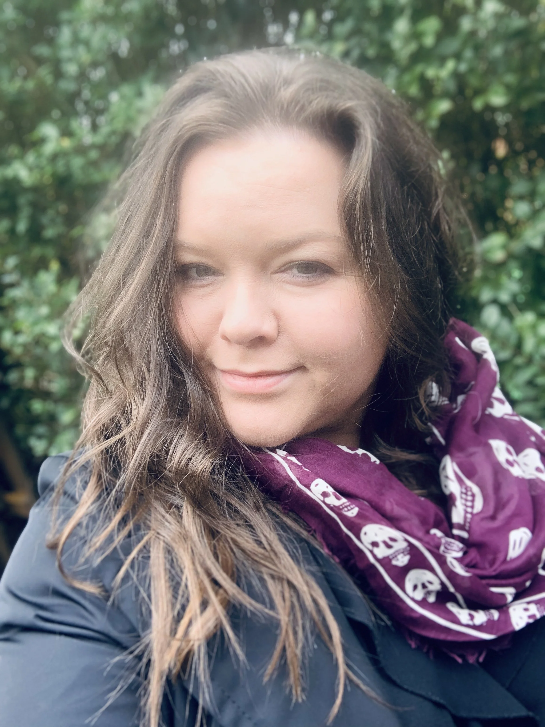 Laura Doak historian author researcher writer lecturer dark hair purple scarf. Early modern British history. Scotland Scottish New Zealand public executions funerals material culture protests riots