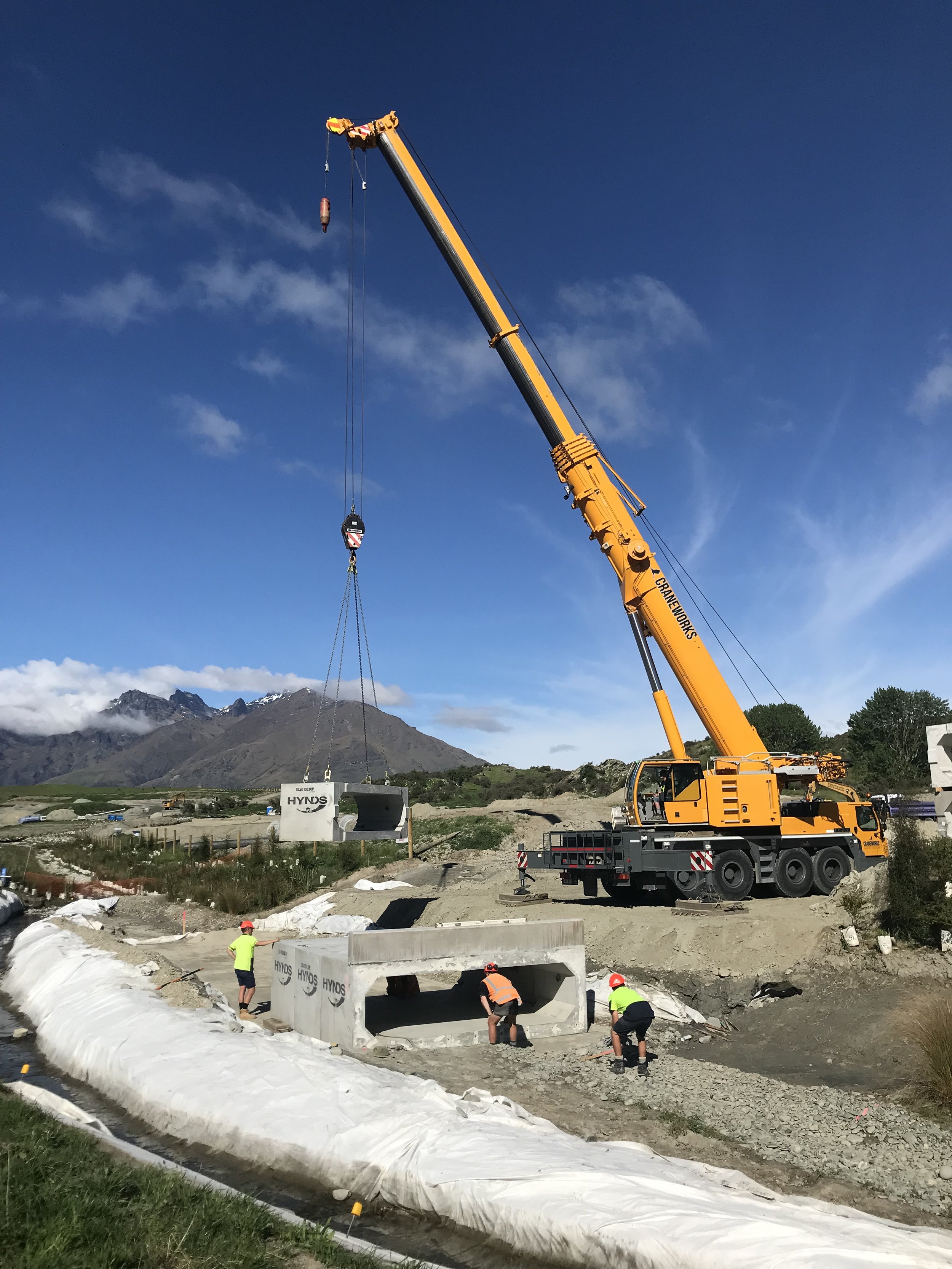 Wastewater, stormwater and drainage infrastructure work with civil construction equipment